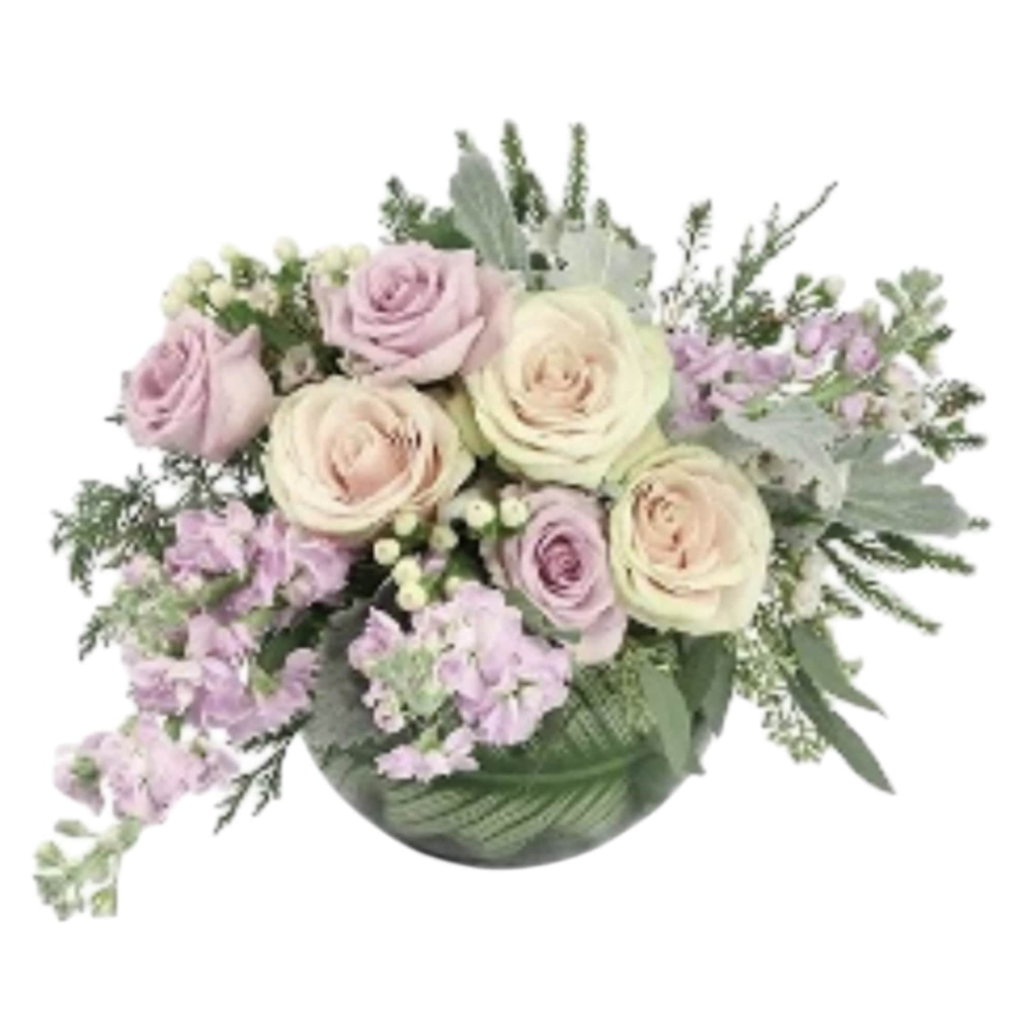 Bouquet of pale pink and cream roses with lavender flowers in a green vase