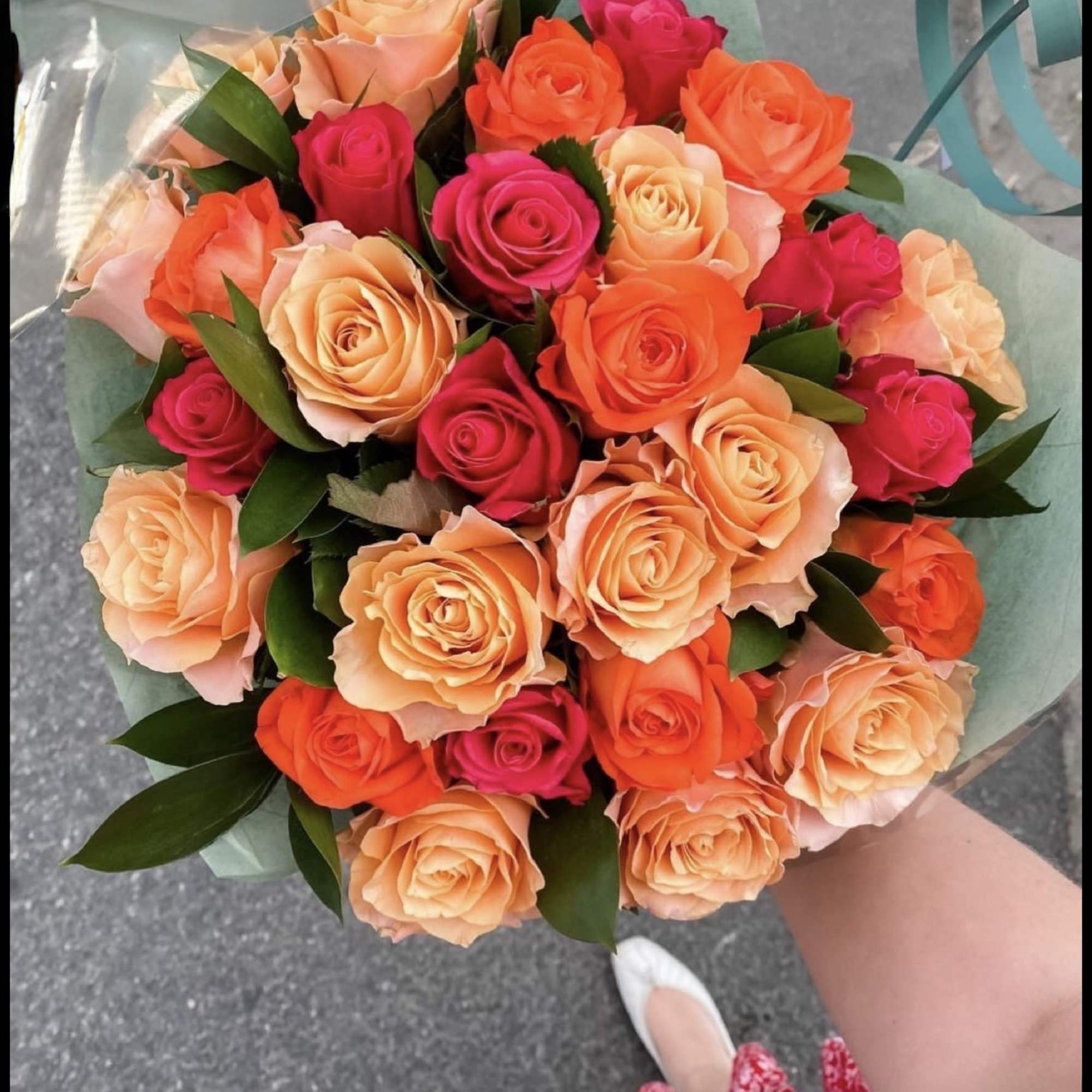 Bright, vibrant, and full of joy, our Colorful Roses Wrapped Bouquet is