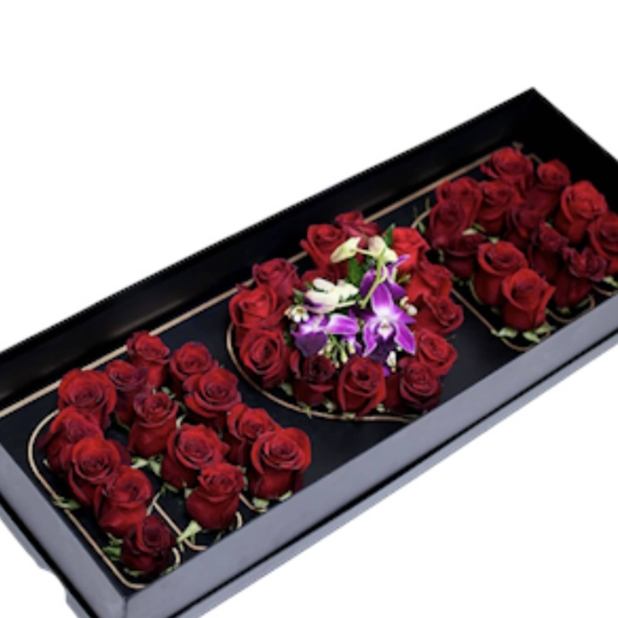Rectangular box of red roses with purple orchids in the center