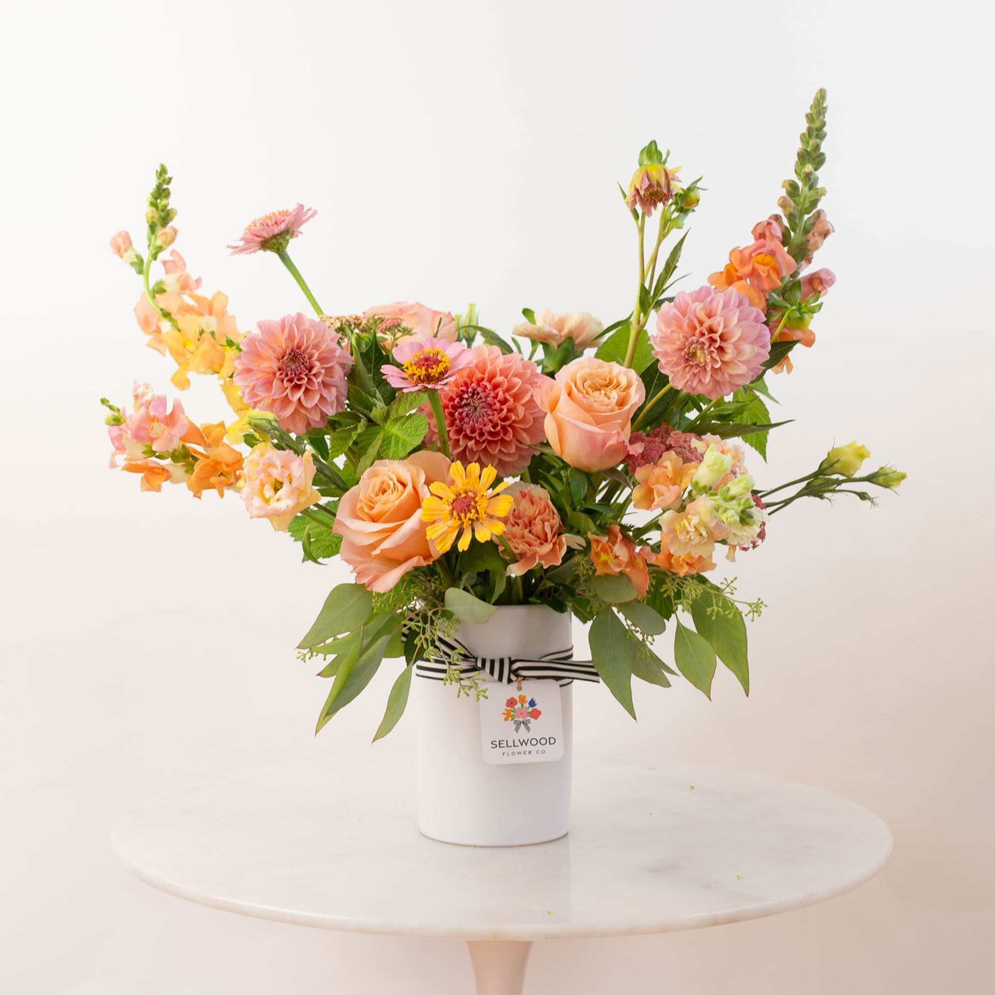 Inspired by the colors of golden hour, this arrangement captures the warmth