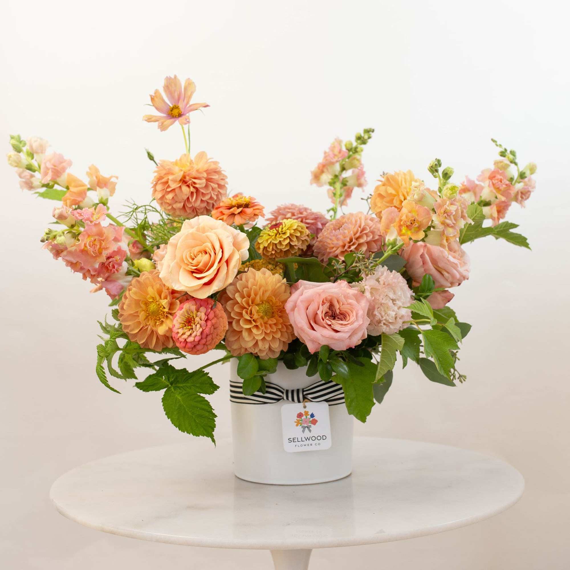 Inspired by the colors of golden hour, this arrangement captures the warmth