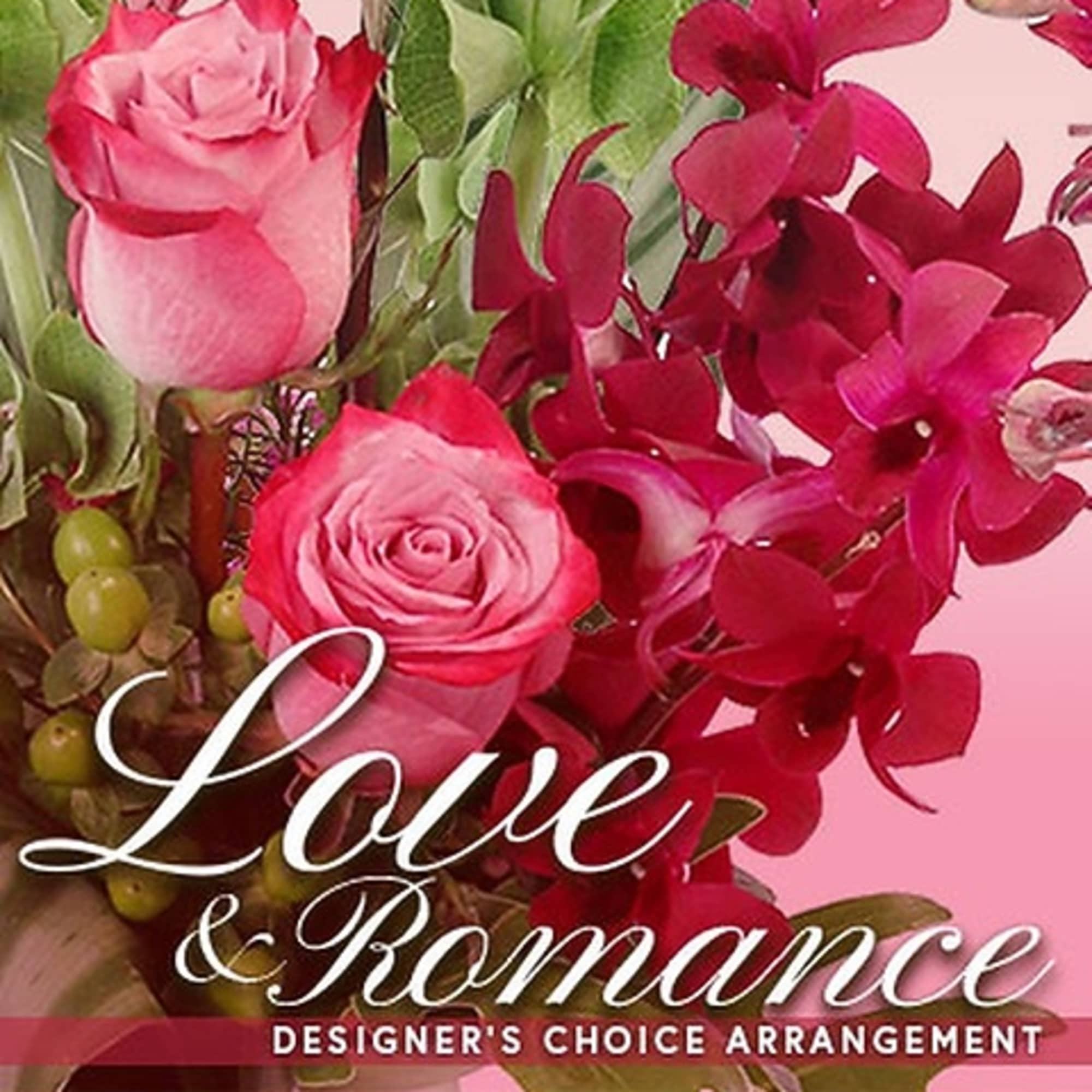 Pink roses with deep magenta orchids and greenery