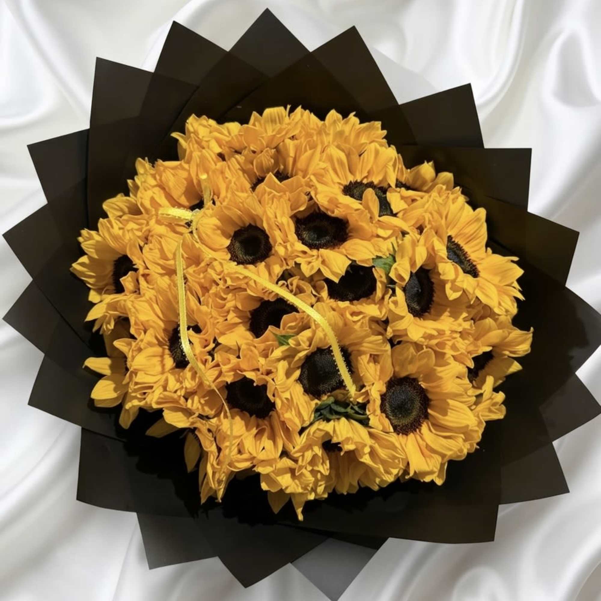 Celebrate life&rsquo;s special moments with this premium sunflower bouquet, carefully arranged with