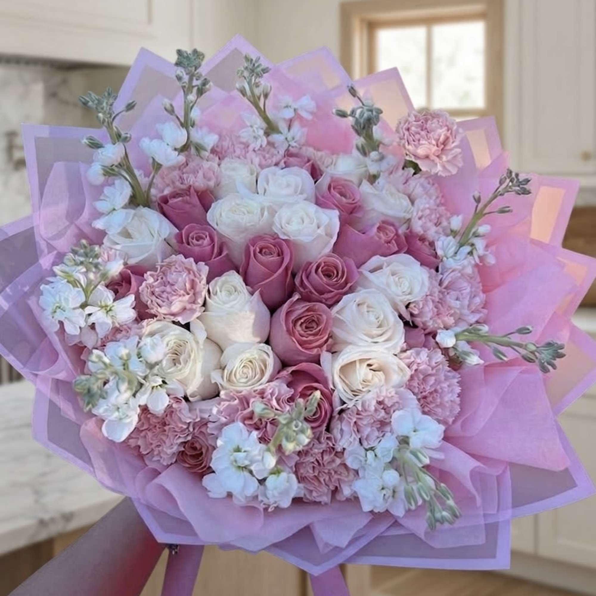 A soft and elegant floral arrangement designed to capture beauty, grace, and