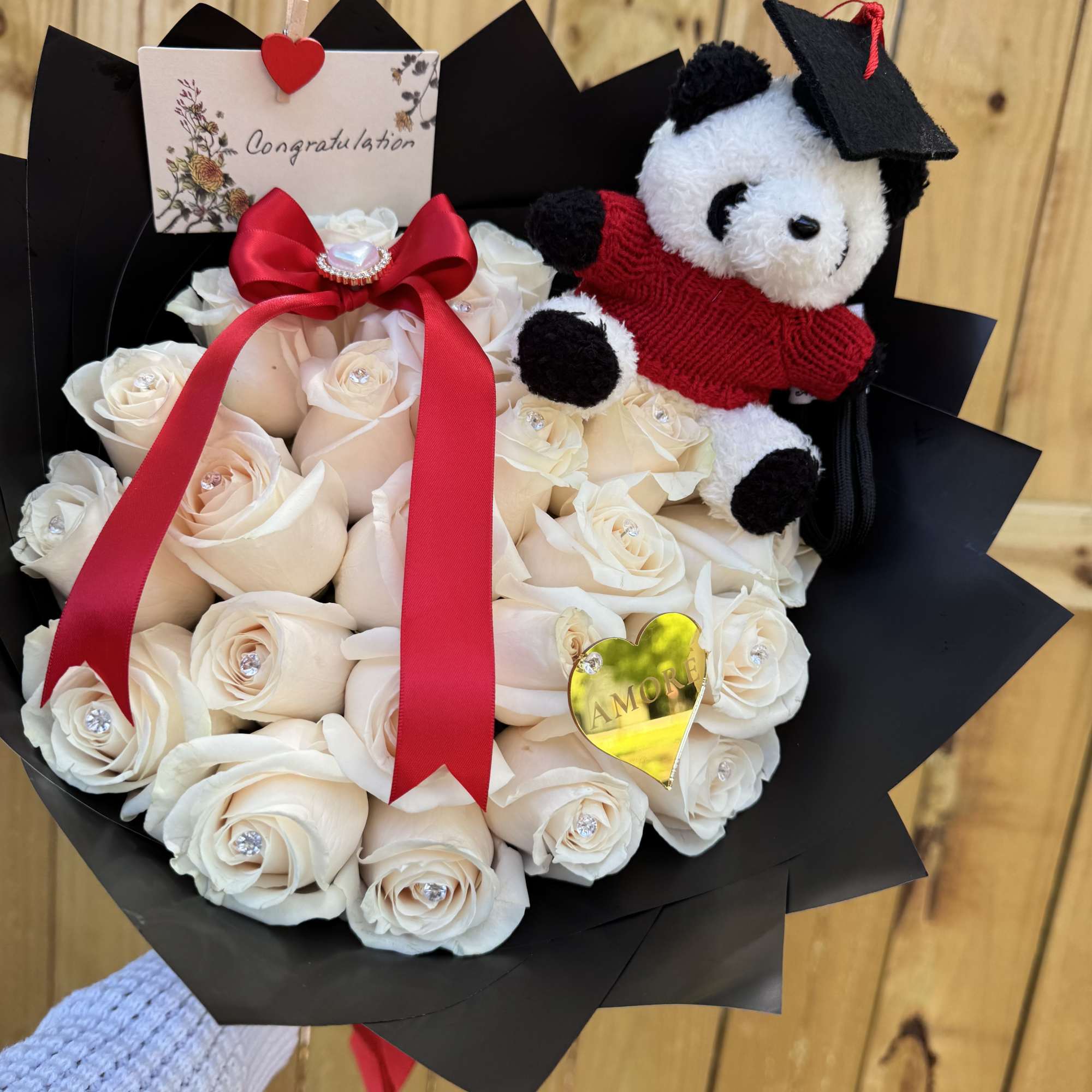 A sweet and elegant graduation bouquet designed to celebrate this special achievement.