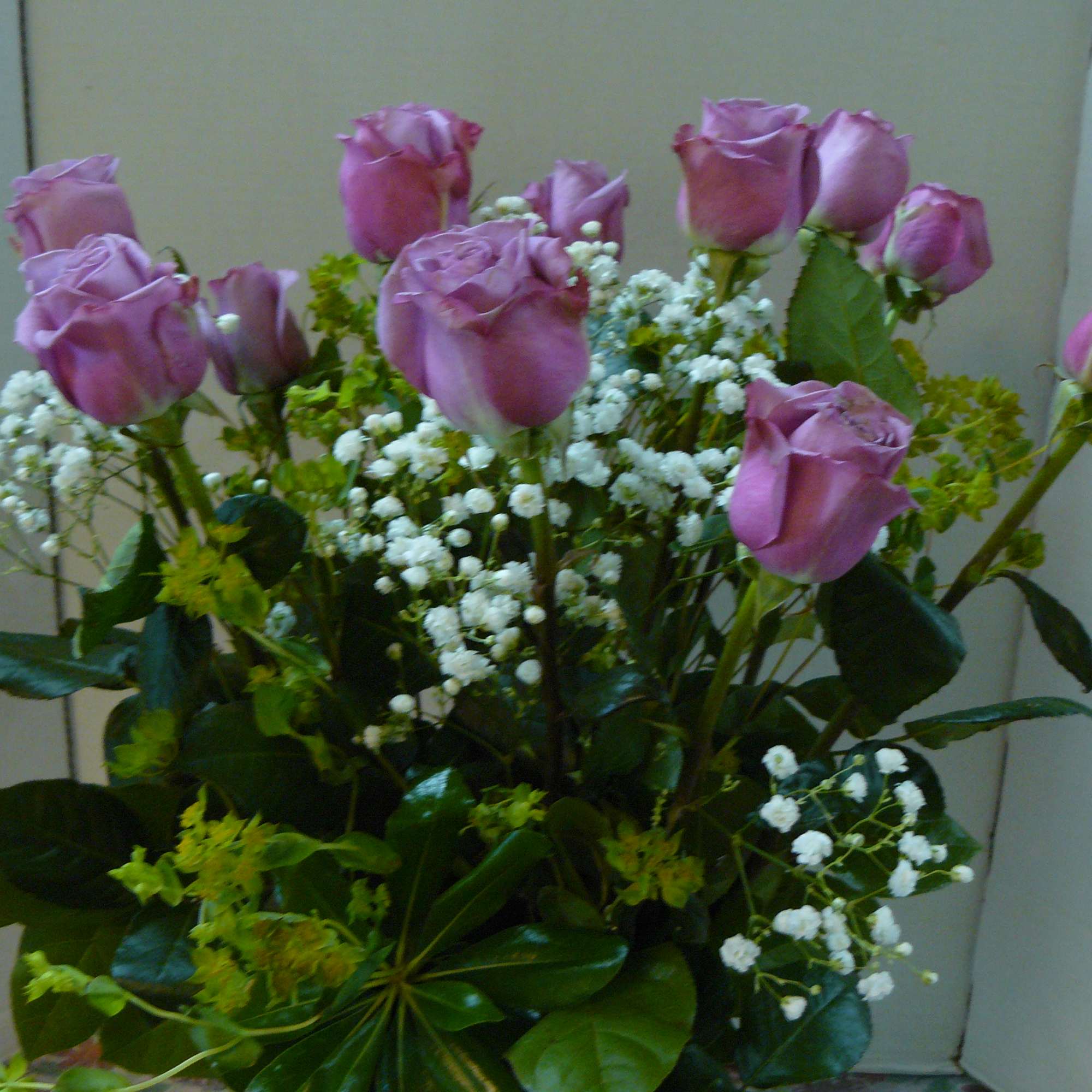 Variety of colors. Roses can be arranged in a vase or wrapped