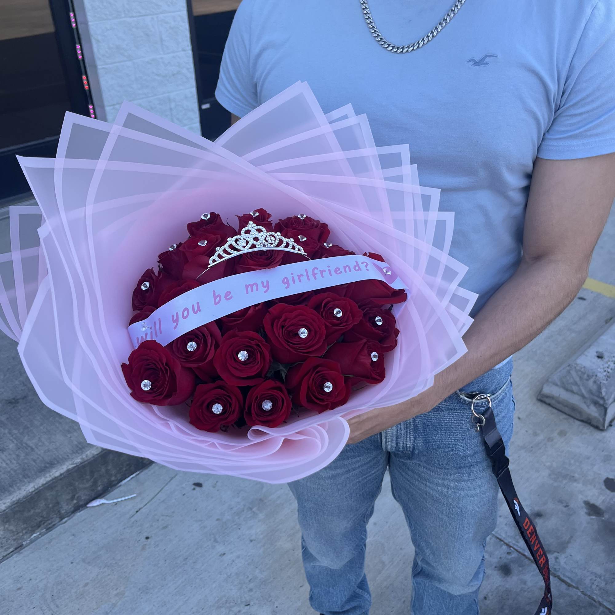 25 Red roses with pins and a message asking &ldquo; will you