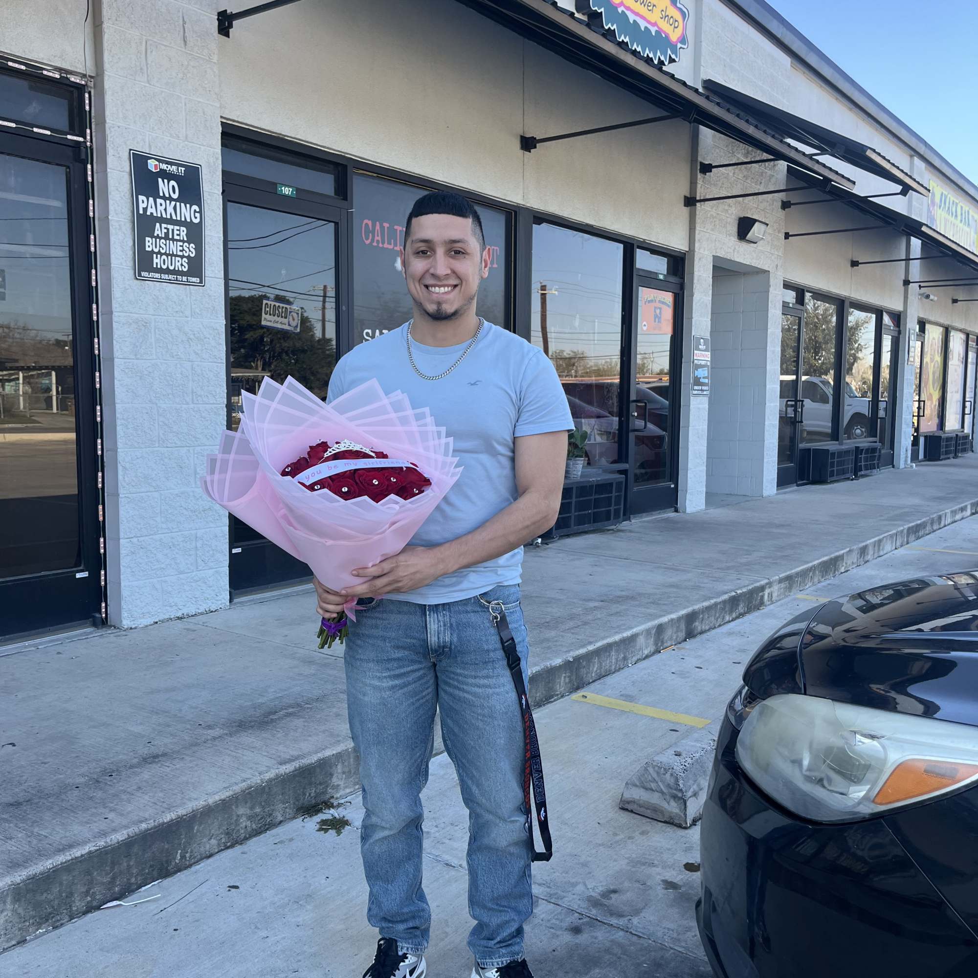 25 Red roses with pins and a message asking &ldquo; will you