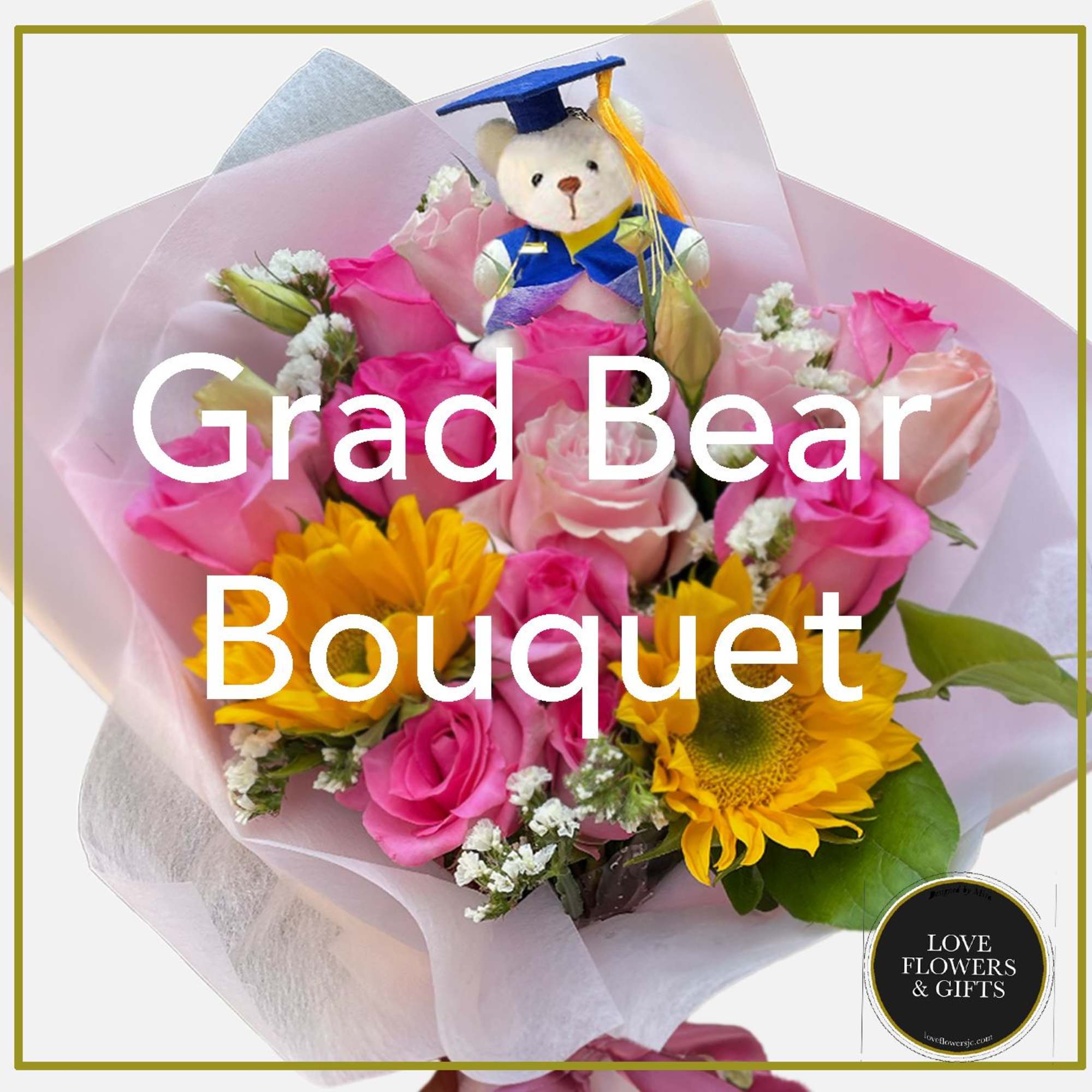 Bouquet of yellow sunflowers and pink roses with a small teddy bear in graduation attire.