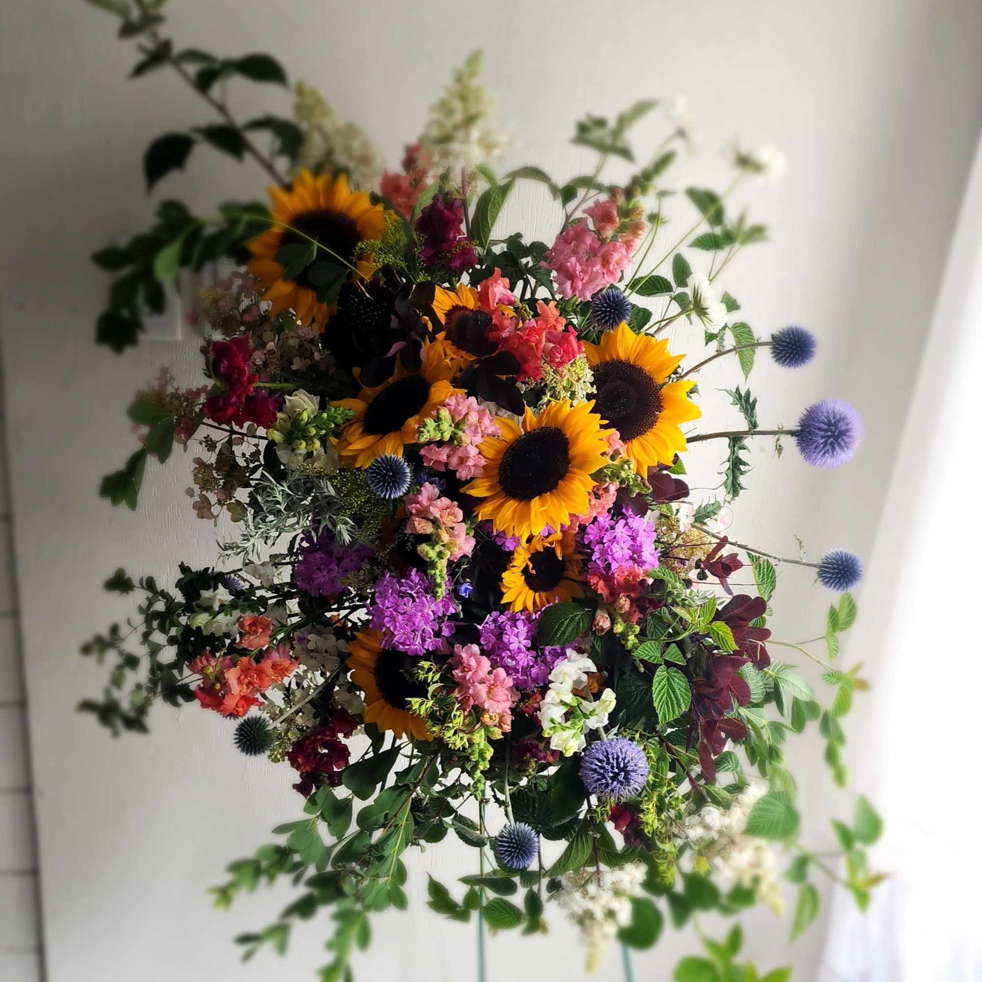 Large mixed bouquet with sunflowers and purple globe flowers