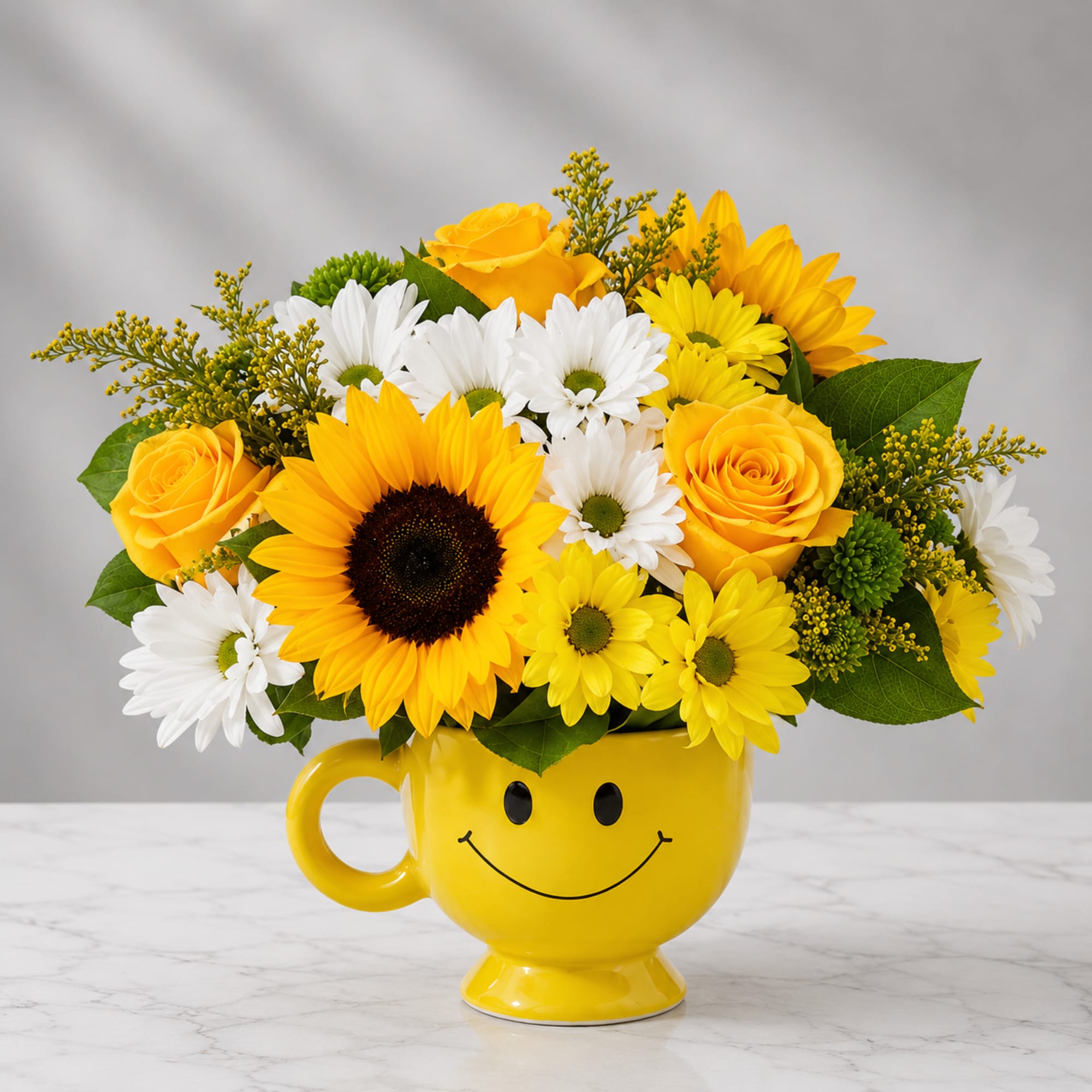 Yellow and white flowers arranged in a smiley-face mug