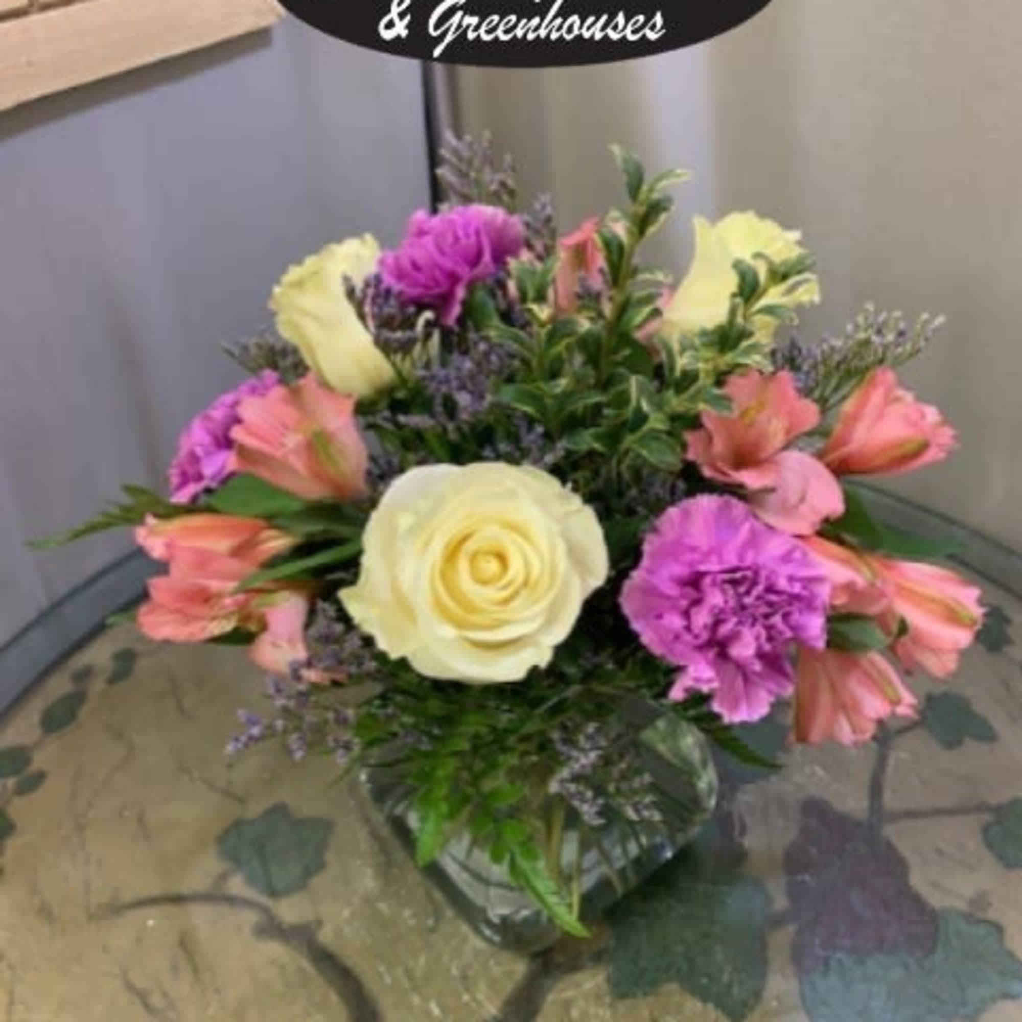 Short vase with roses, daisies and miniature carnations. Designed at Haehn Florist, photo 2 of 4
