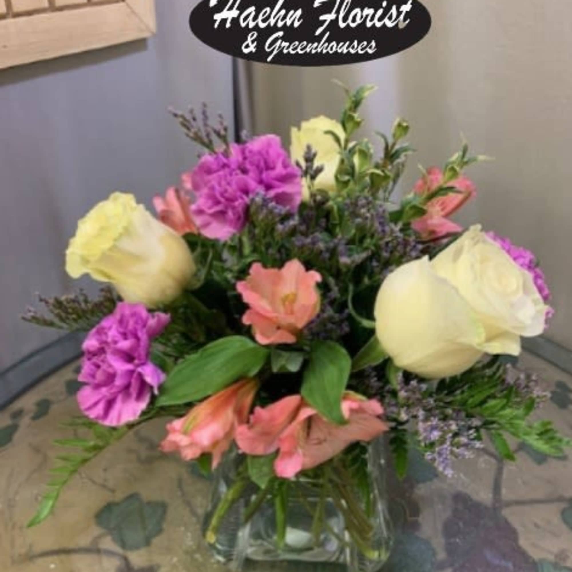 Short vase with roses, daisies and miniature carnations. Designed at Haehn Florist, photo 3 of 4