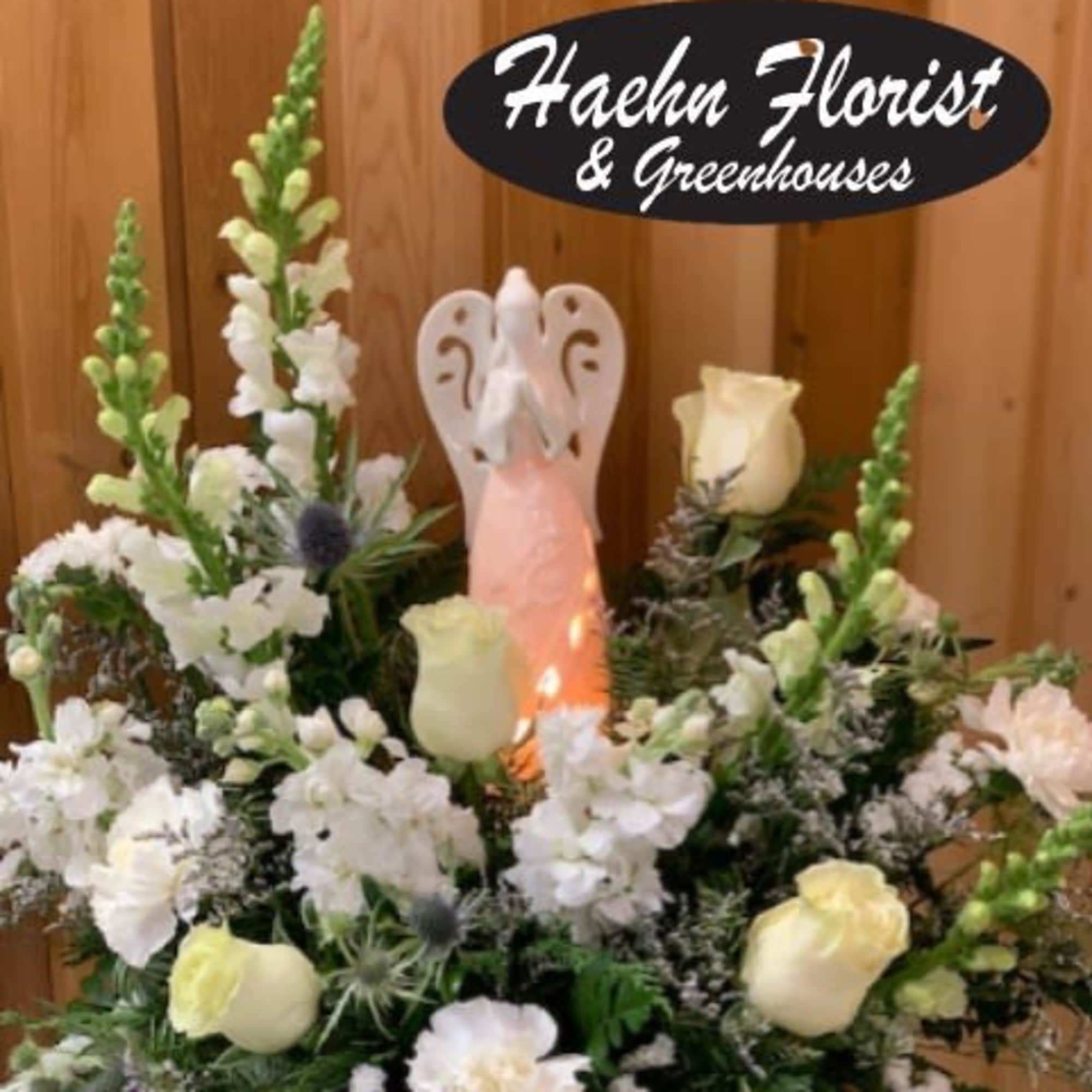 White Angel &ndash; All White Flower Arrangement
***ANGEL MAY VARY

Bring elegance, peace, and