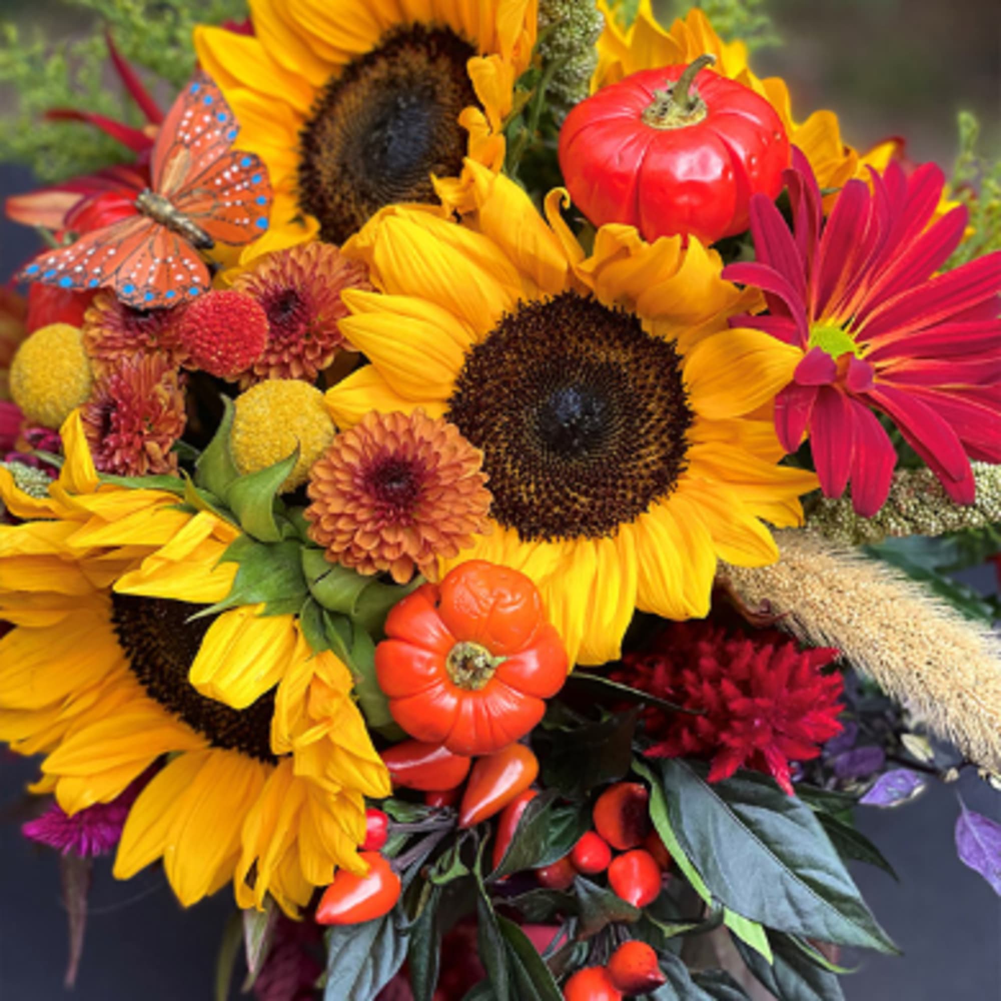 Bright bouquet with sunflowers, mums, and decorative pumpkins
