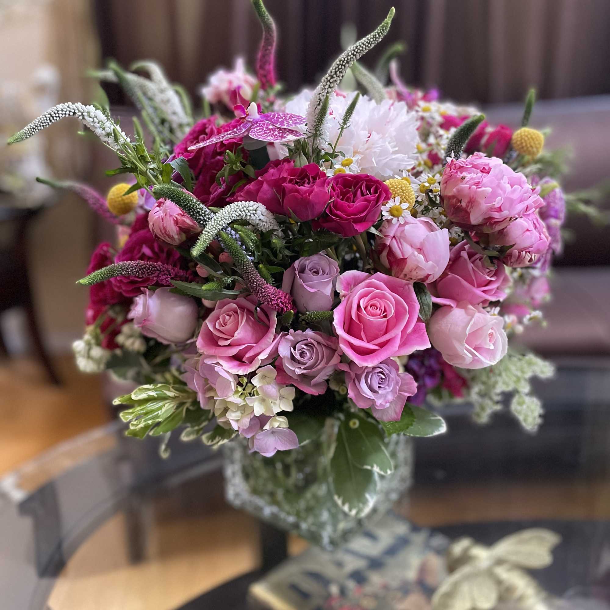 Pink and lavender bouquet in a glass vase