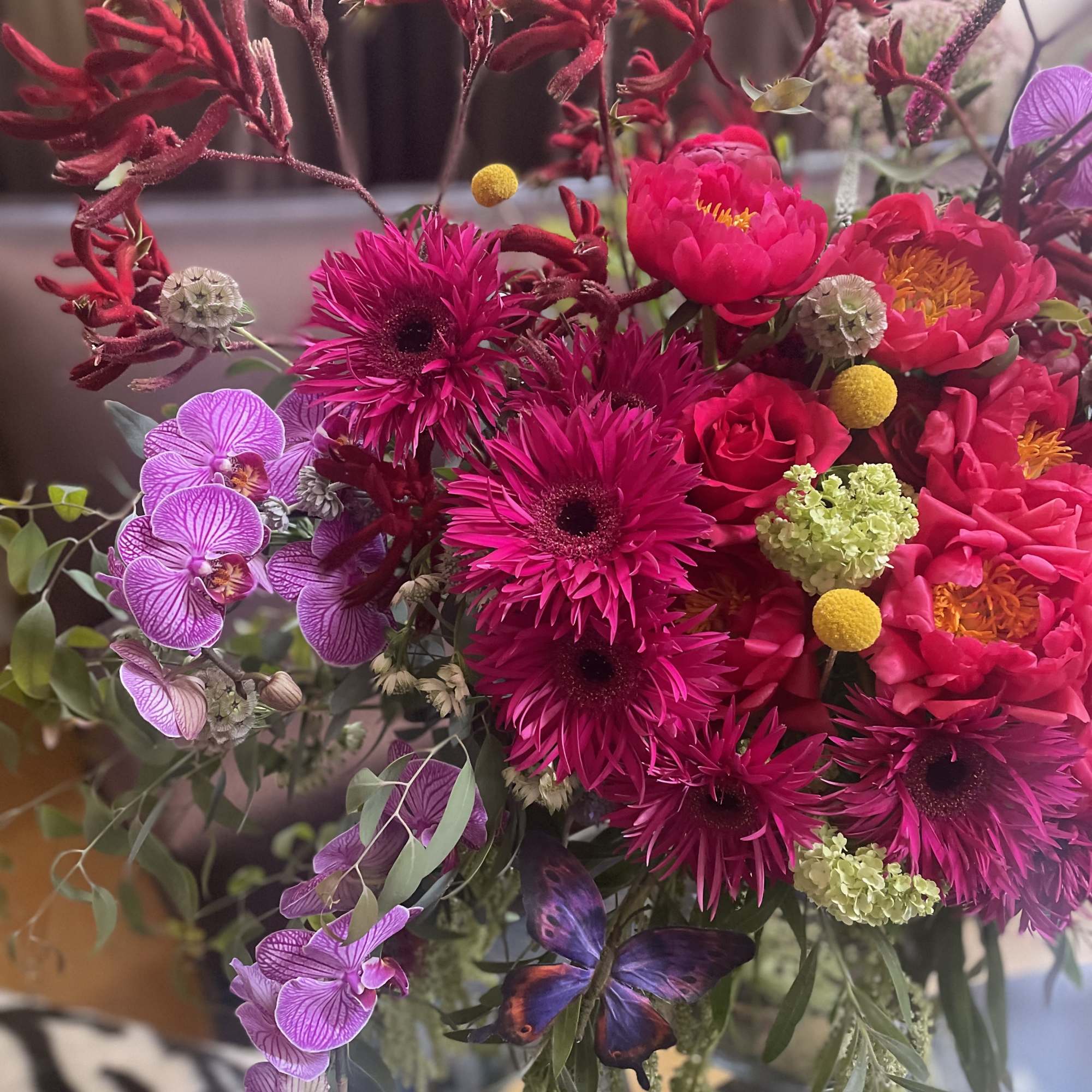 Bright pink and purple mixed bouquet with orchids and gerbera daisies