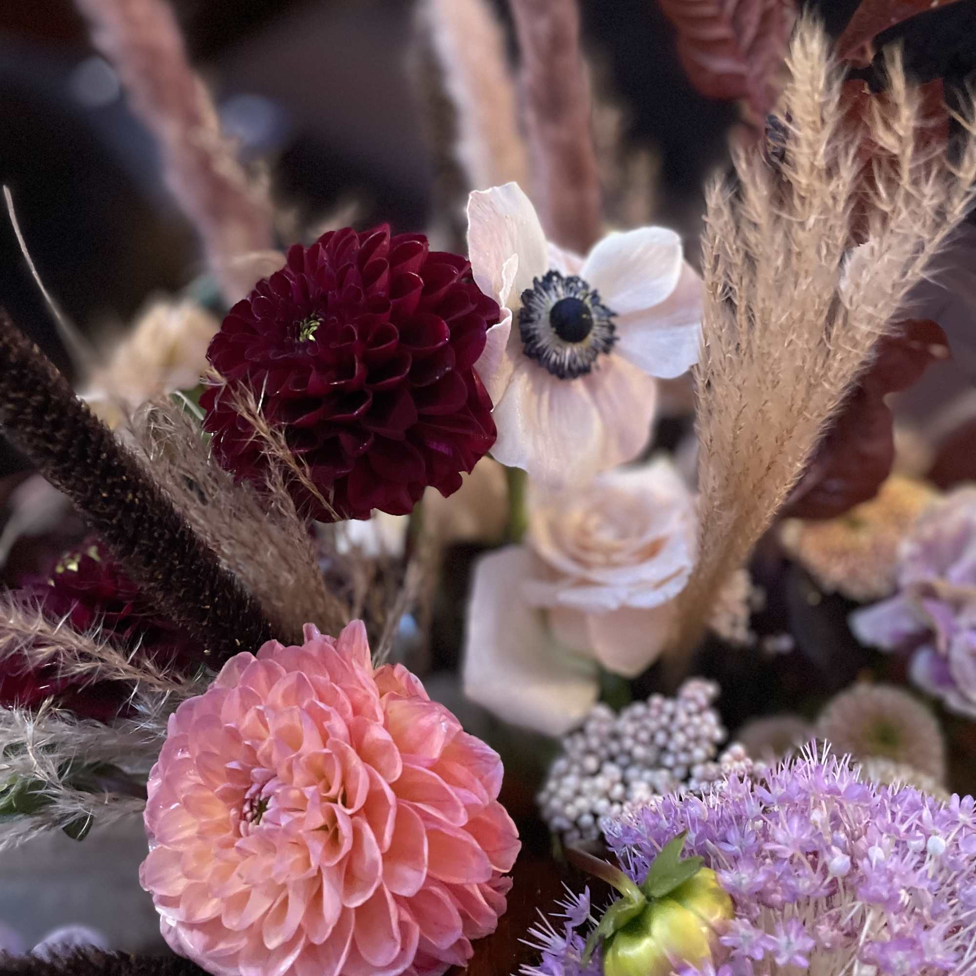 Mixed bouquet with pink, burgundy, and white flowers