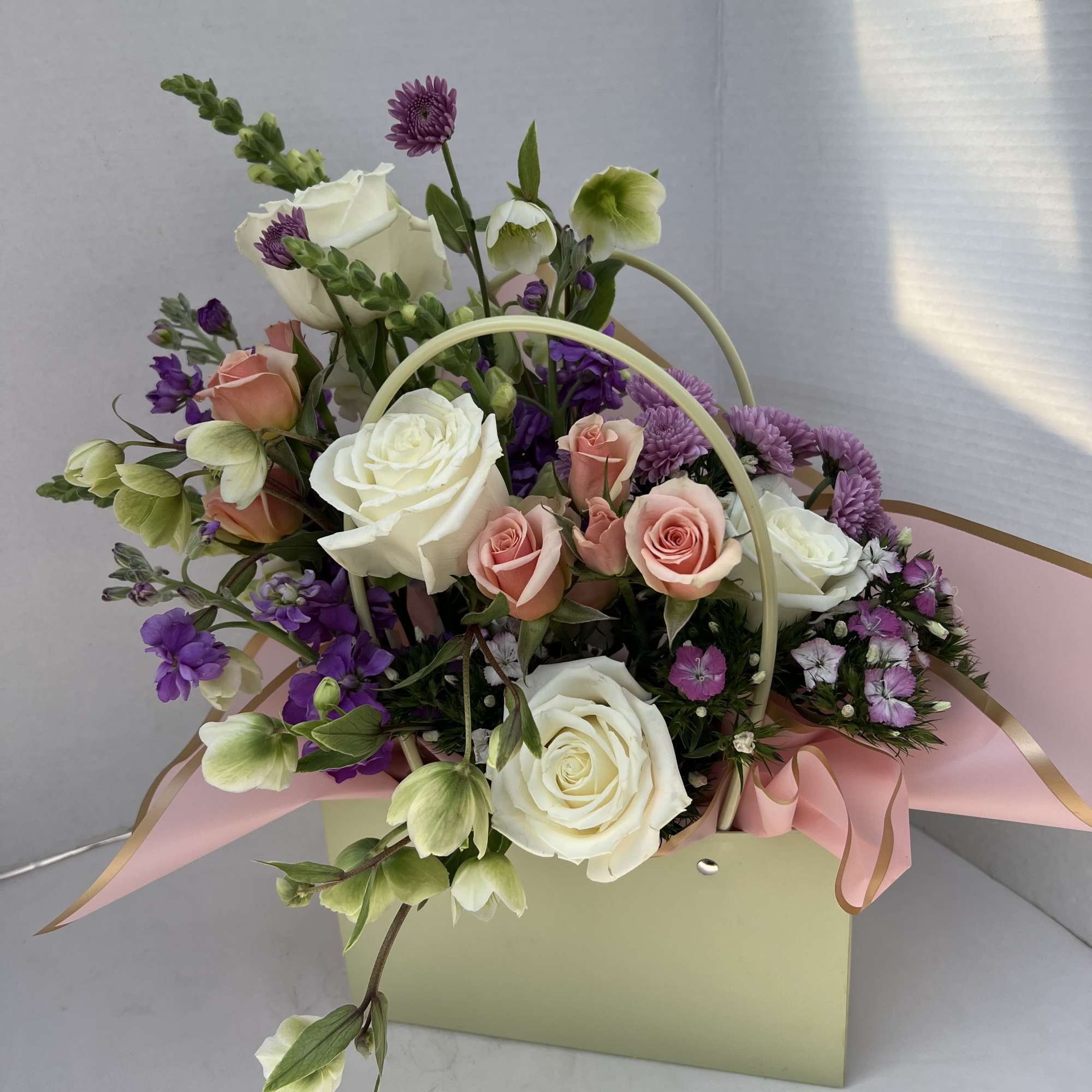 Our Blooming Purses are thoughtfully designed arrangements, blending soft, feminine colors with