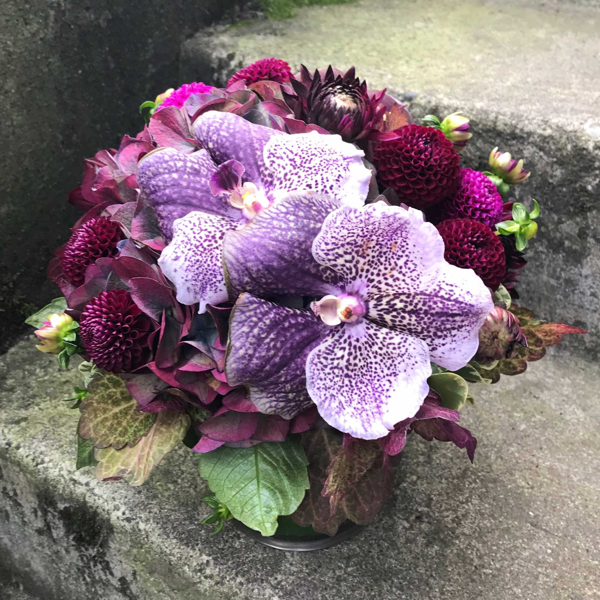 A compact arrangement perfectly scaled for a small desk, nightstand or side