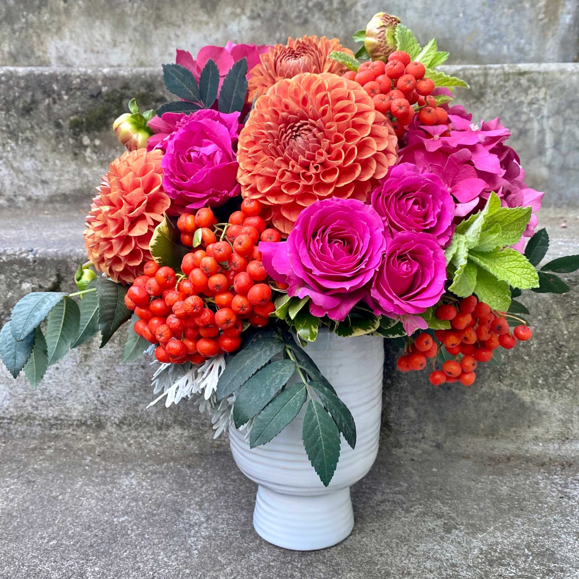 A Designer's Choice mixed floral arrangement featuring summer flowers such as dahlias, photo 8 of 9