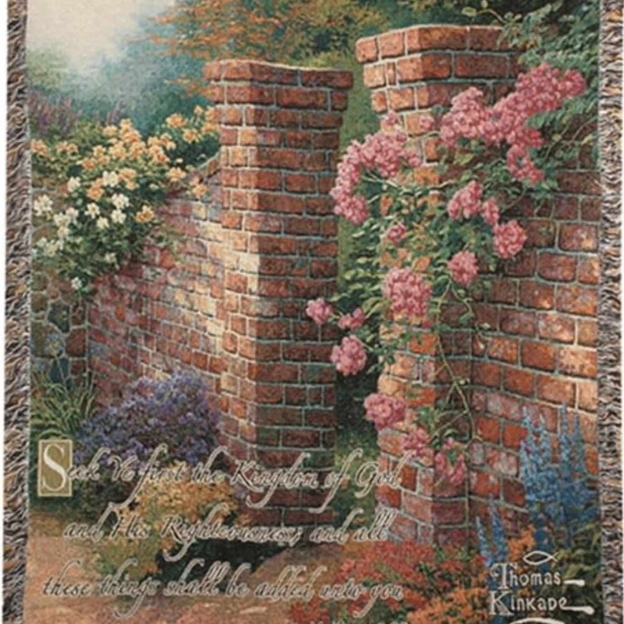 Decorative woven throw with a garden scene of brick walls and pink flowers