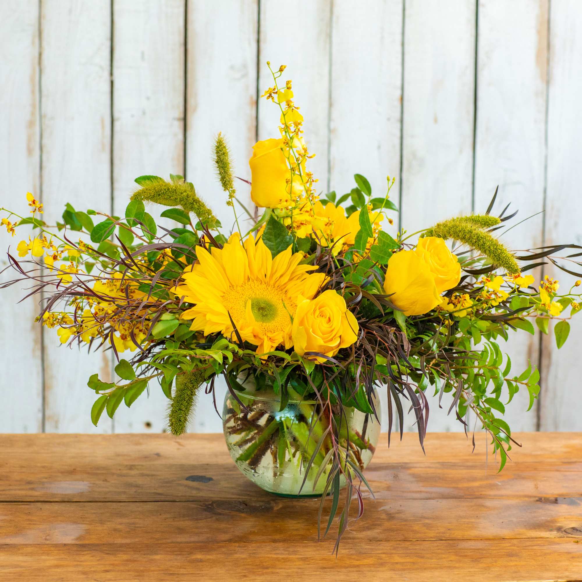 Brighten any day with the Sunny Meadow Delight, a cheerful and vibrant