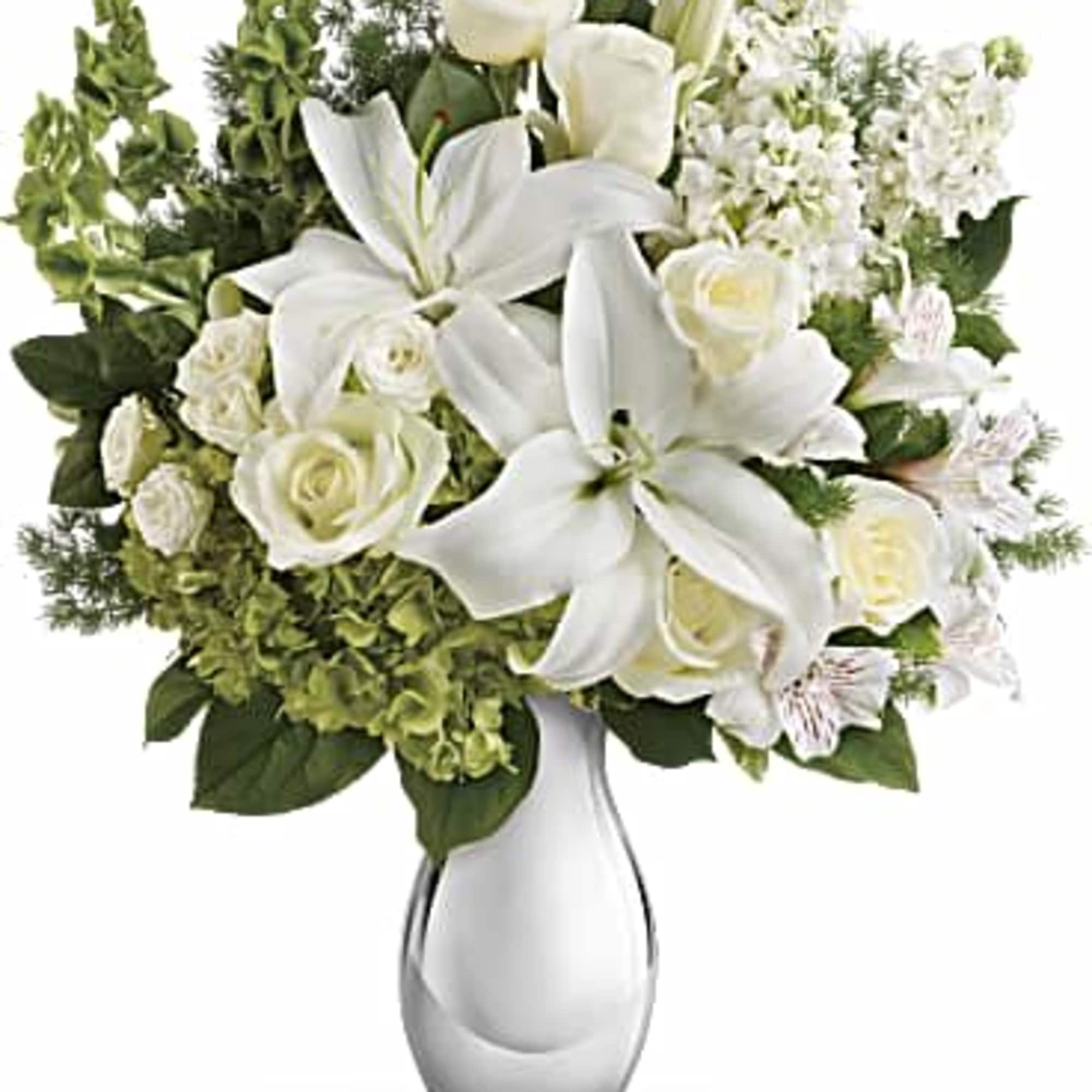A dreamy bouquet of white sympathy flowers is a comforting reminder of