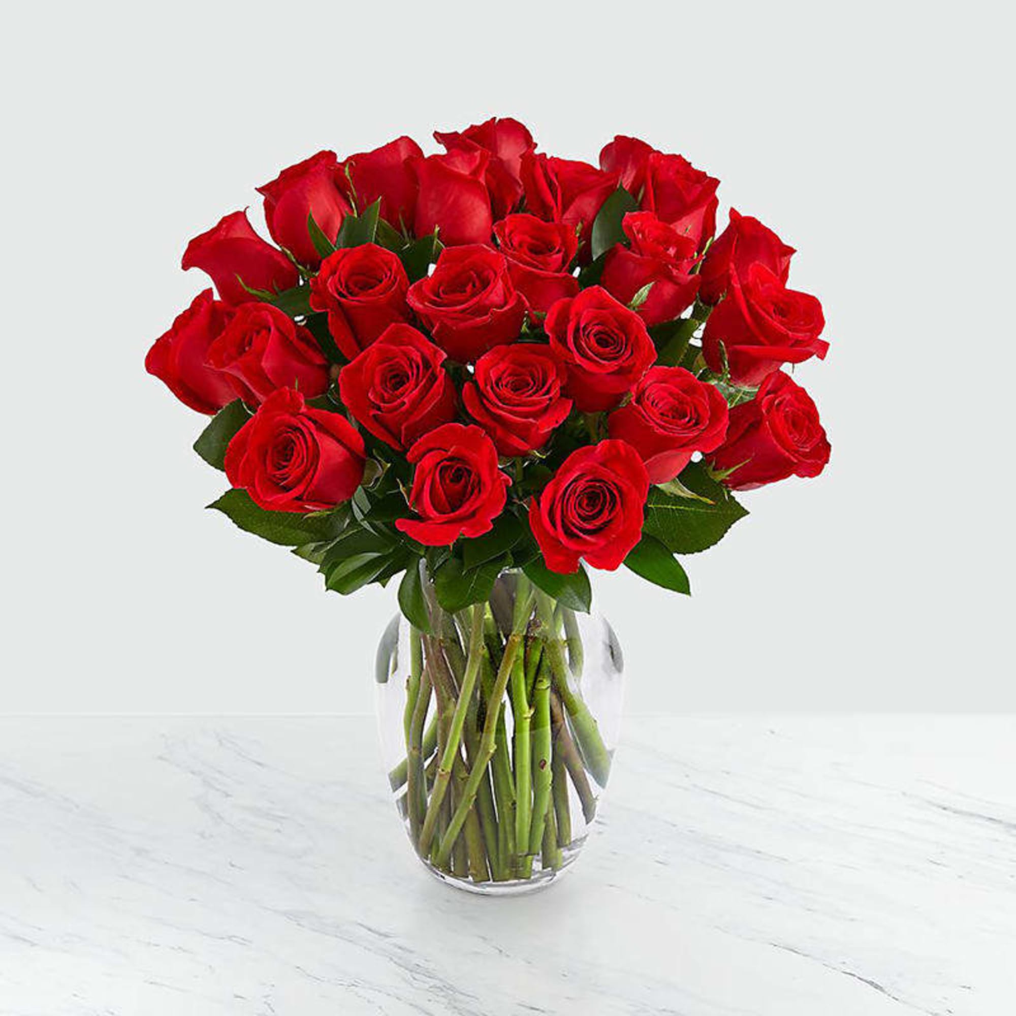 Classic Red Roses Bouquet with a simple glass vase creating a timeless