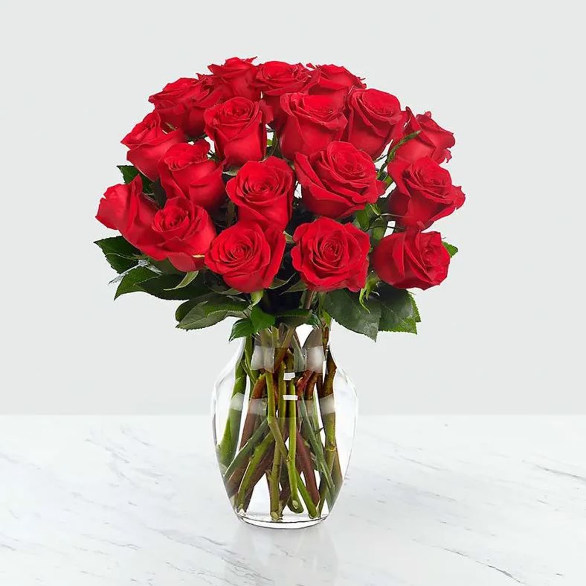 Classic Red Roses Bouquet with a simple glass vase creating a timeless