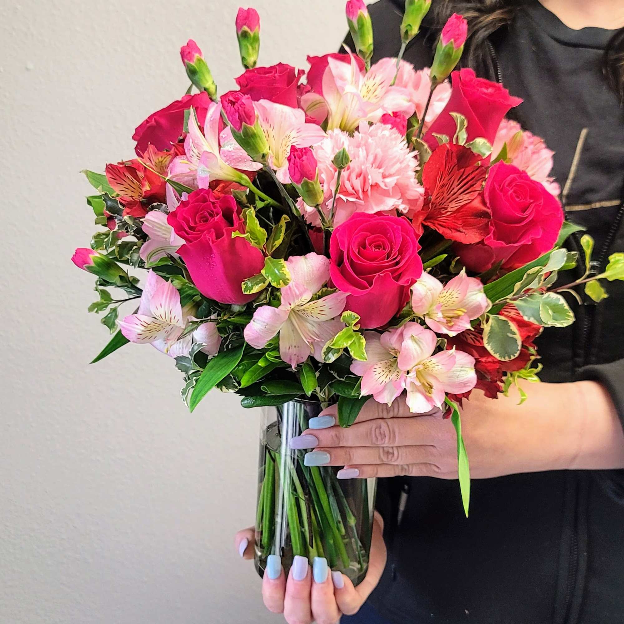 This vibrant bouquet features hot pink roses, soft pale pink alstroemeria, and, photo 2 of 2