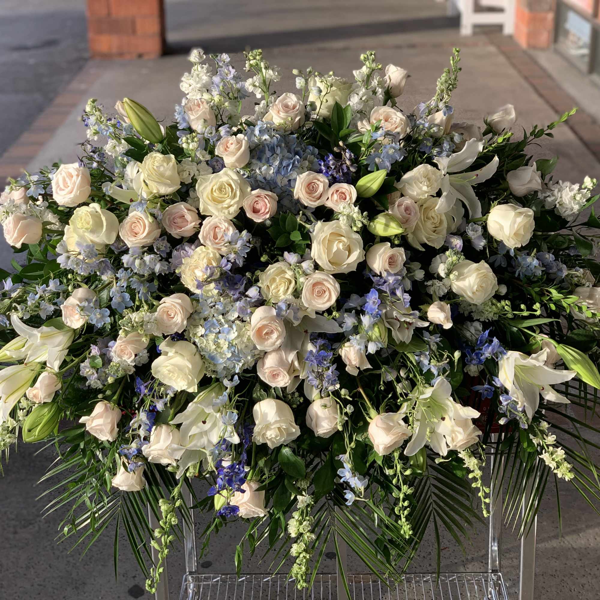 Large white and blush floral spray with lilies and roses, photo 3 of 3