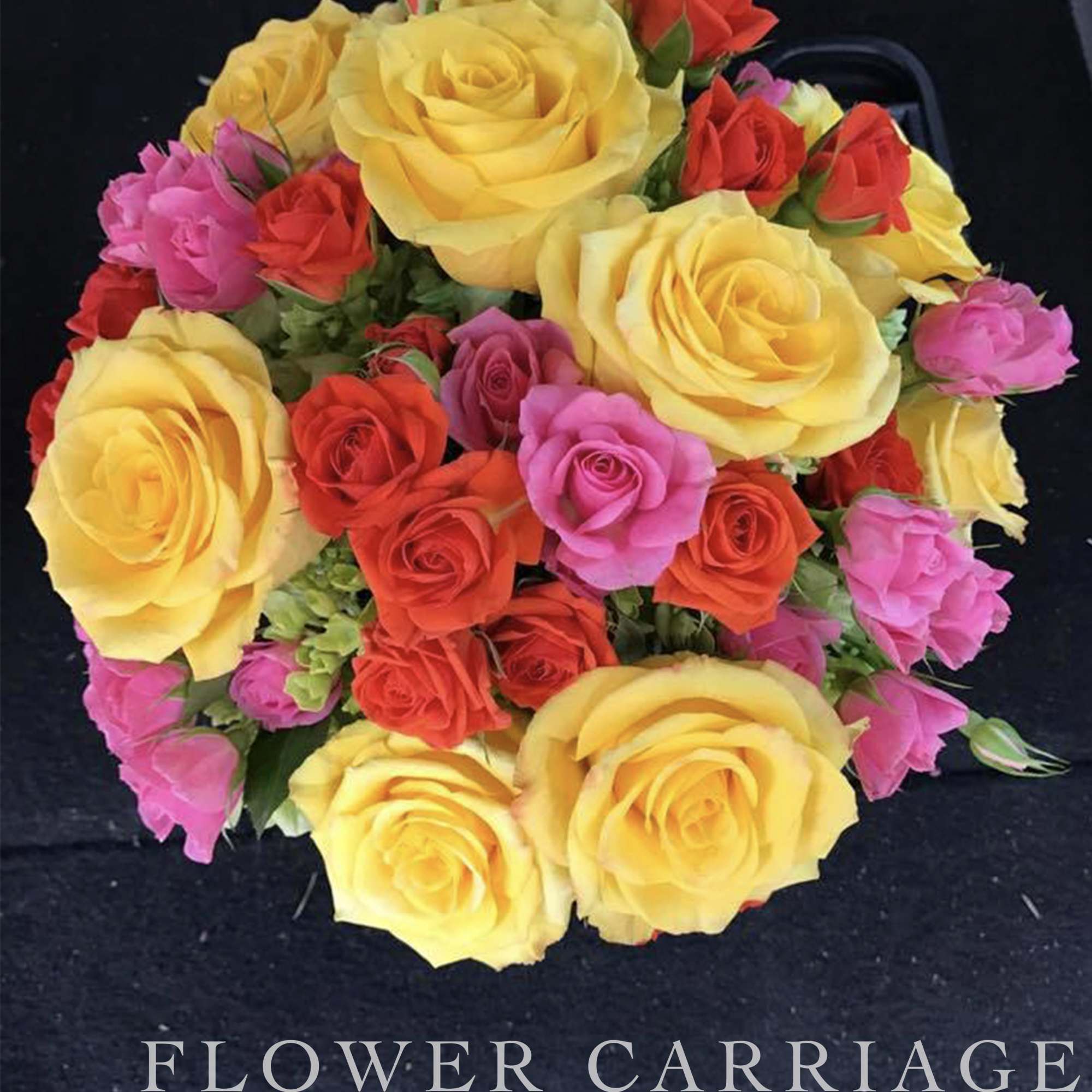 Bouquet of yellow, red, and pink roses