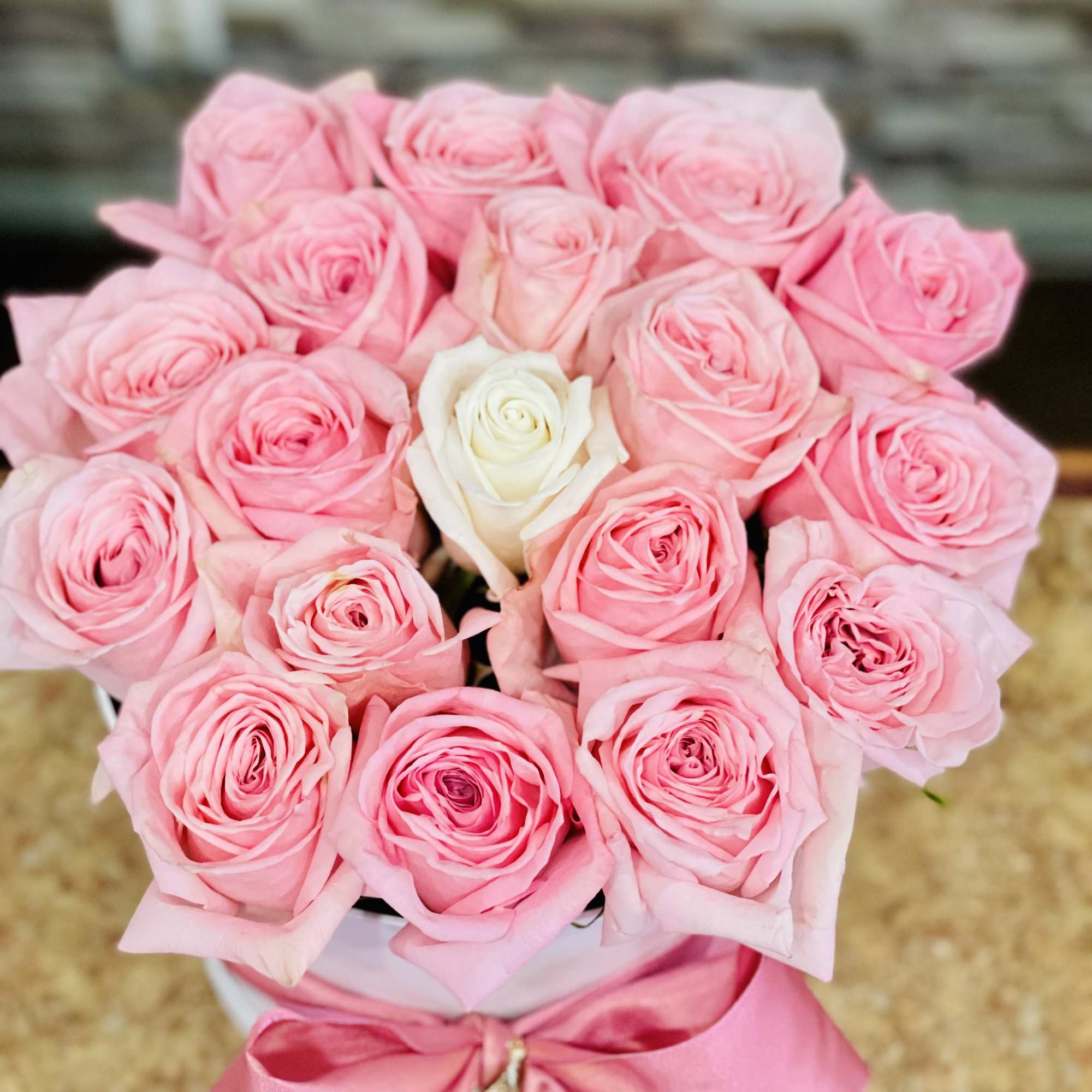 This chic box arrangement showcases the sheer beauty of lovely Roses.
, photo 2 of 2