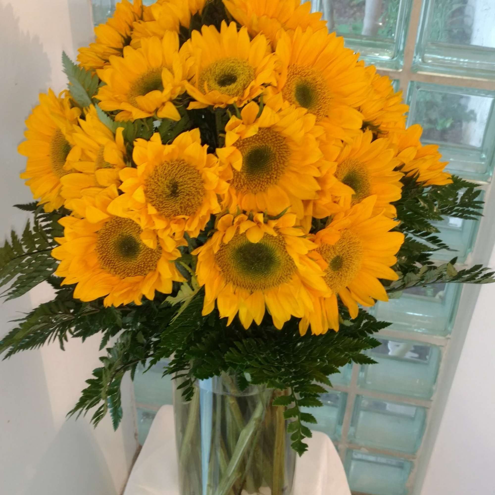 We've filled a vase full of sunflowers (well, at least 25) to
