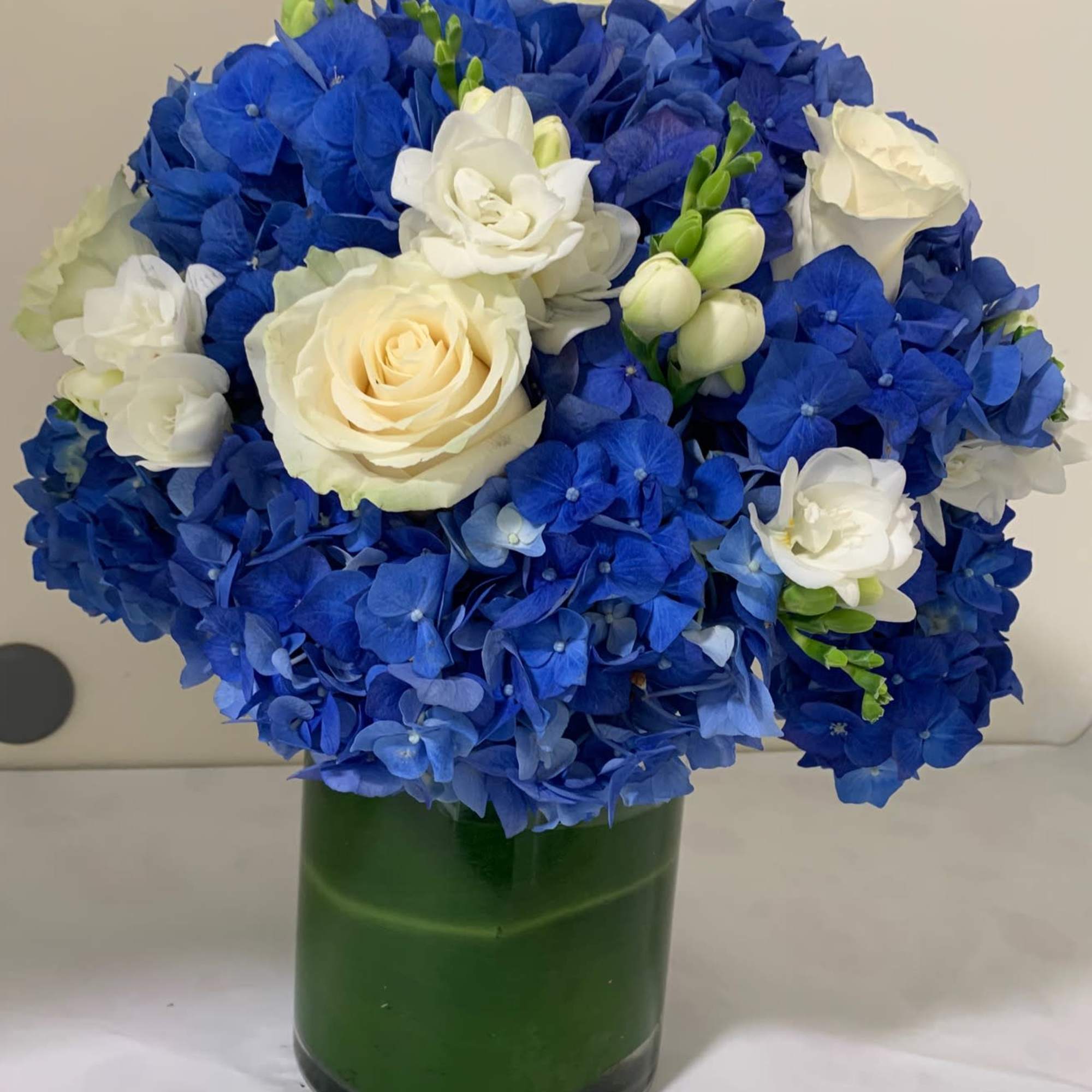 Beautiful arrangement, made with the finest Blue Dutch Hydrangea and White Roses, photo 3 of 3