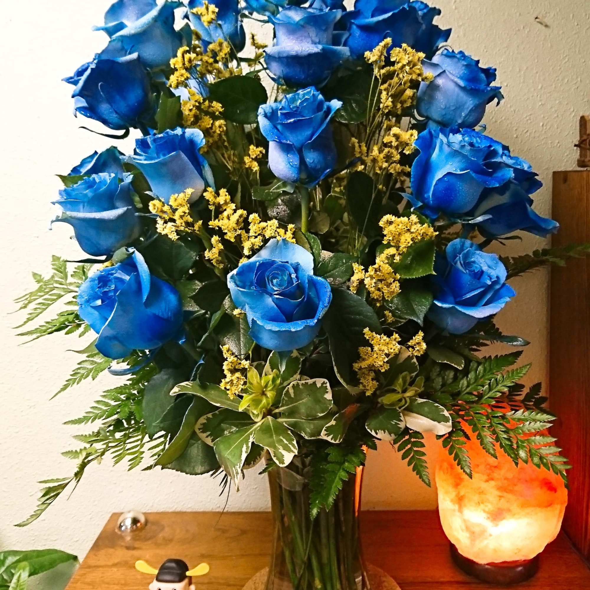 Our Hues of Blue Roses Bouquet features 24 long-stem Ecuadorian roses, custom-tinted