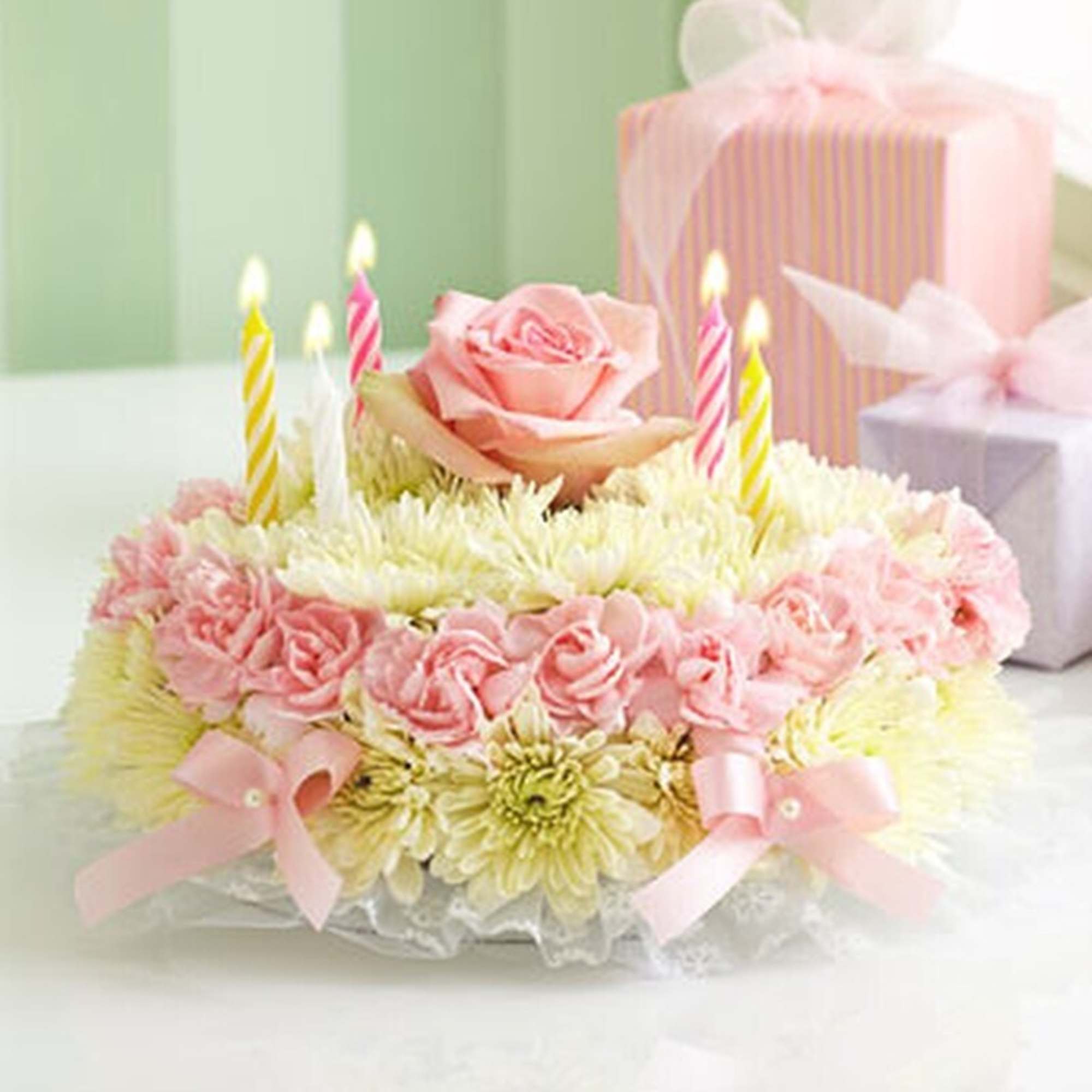 Our signature floral birthday cake may look good enough to eat, but