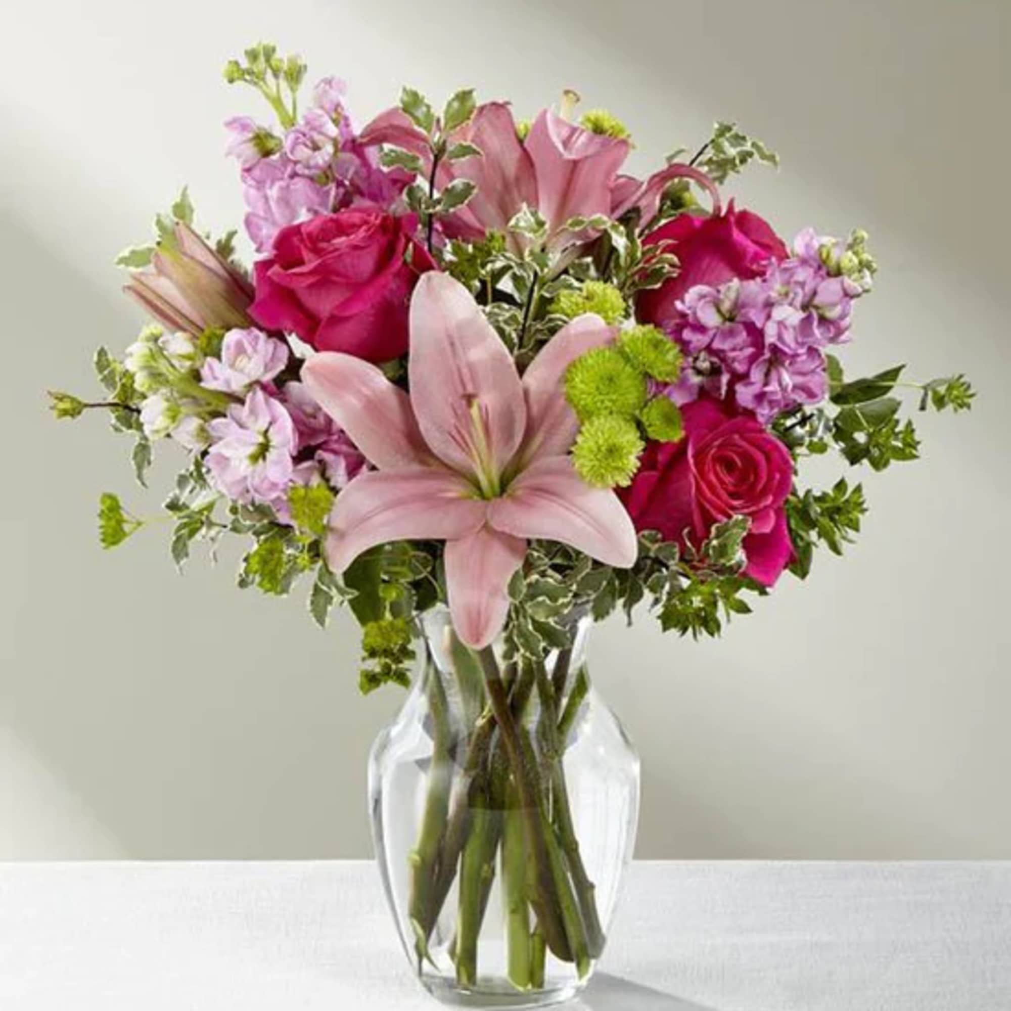 The Pink Posh Bouquet is chic and pink to help you celebrate