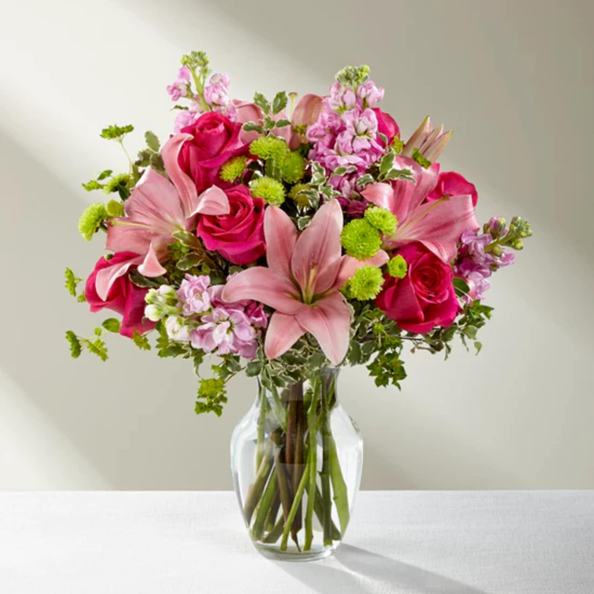 The Pink Posh Bouquet is chic and pink to help you celebrate