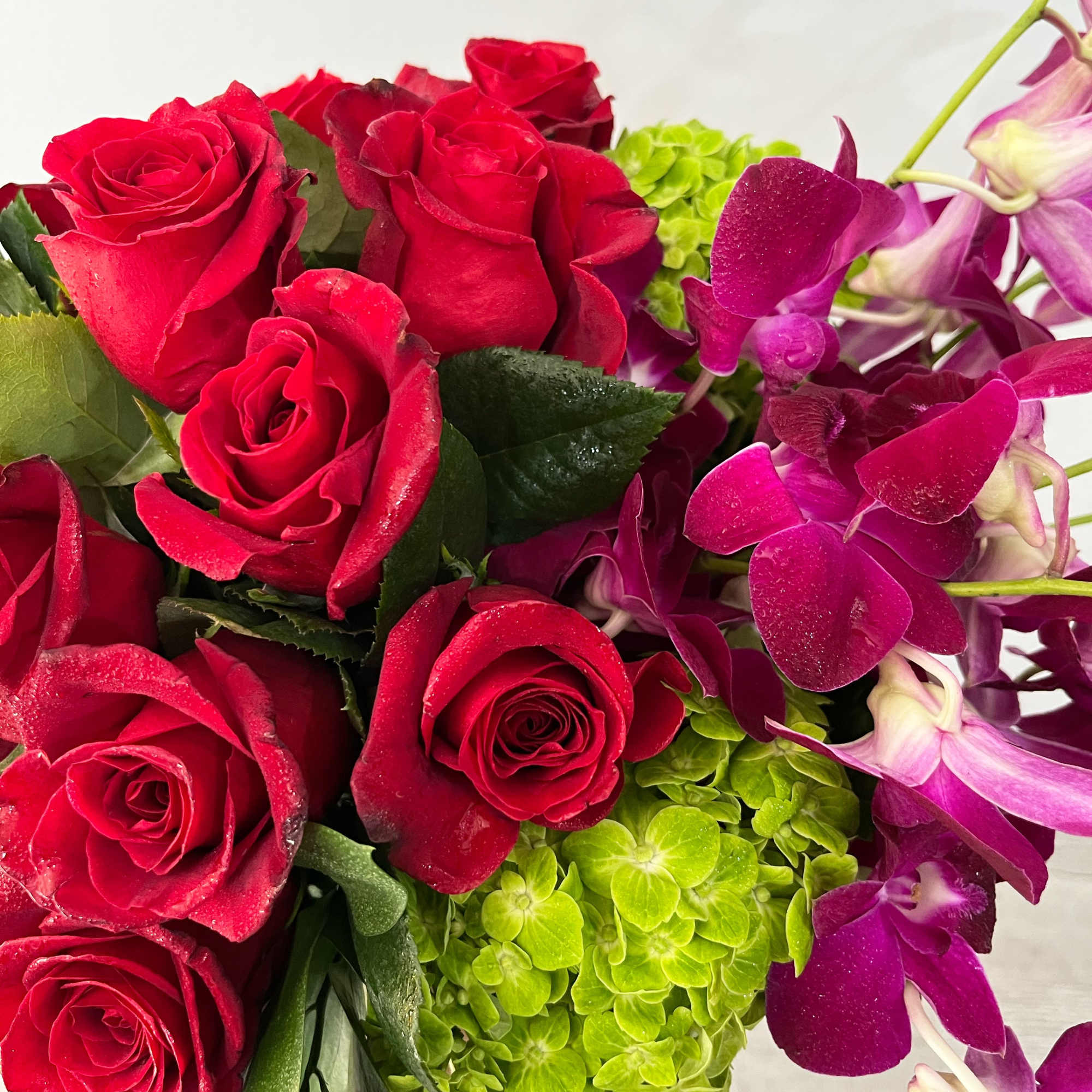 A celebration of luxury and life, this large and jewel toned arrangement, photo 2 of 2