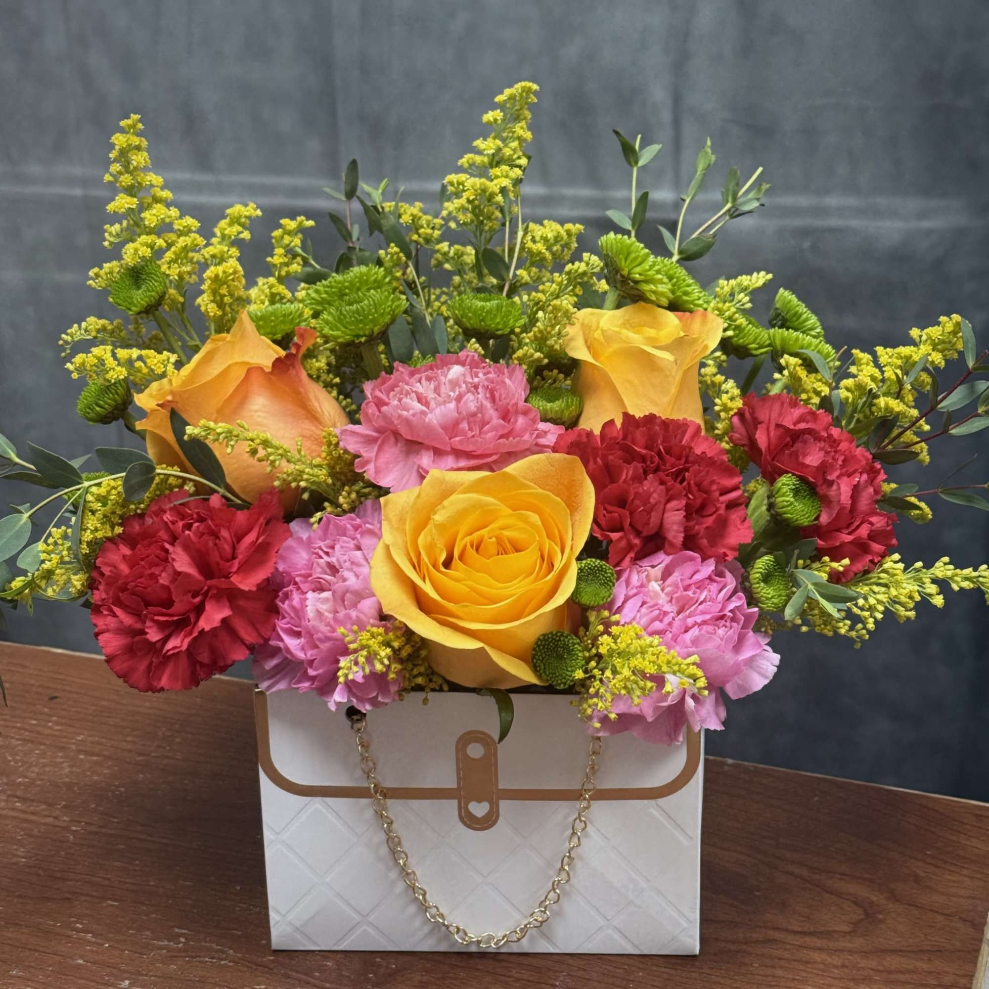 Step into a world of vibrant delight with our cheerful flower arrangement, photo 2 of 2
