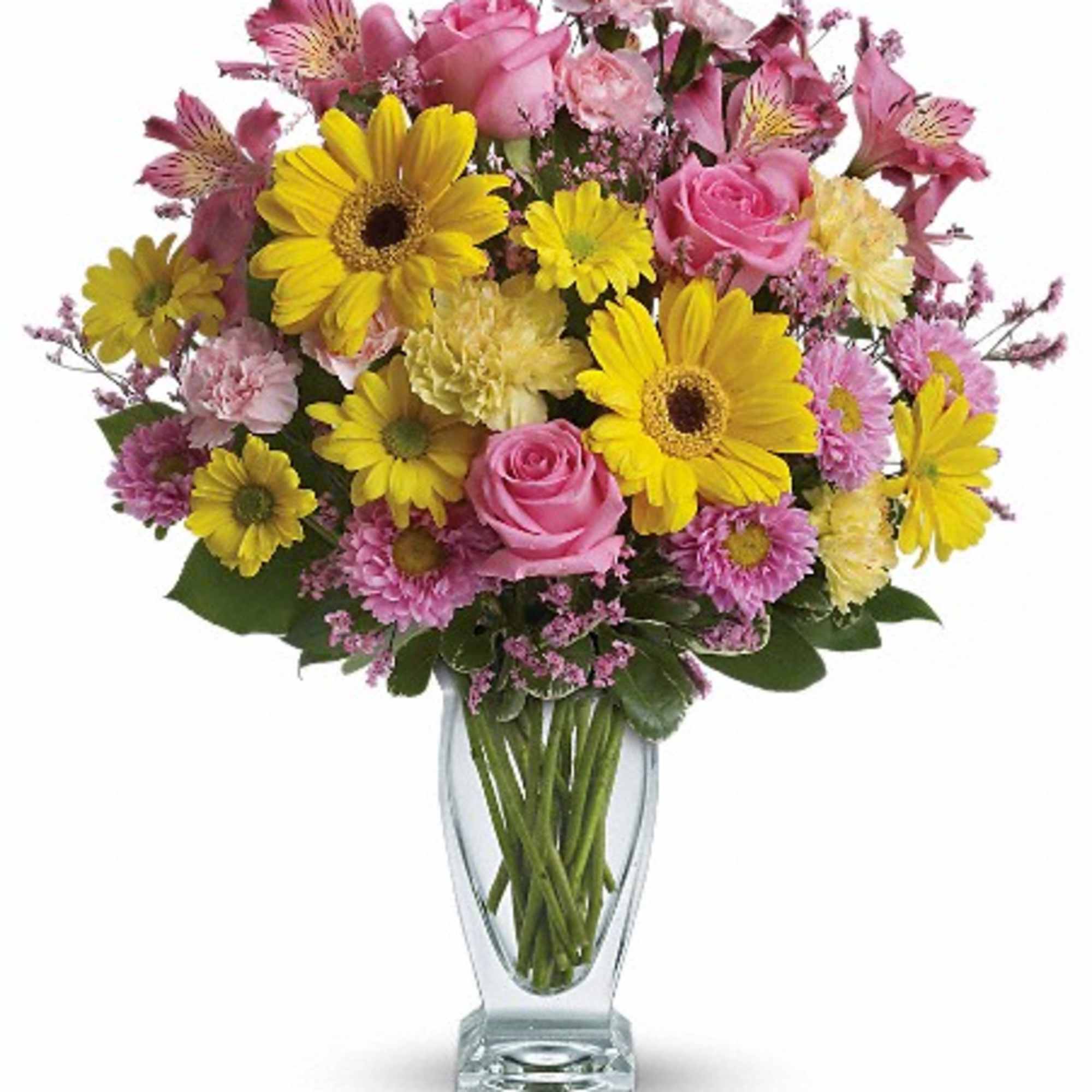 Pink and yellow mixed flower bouquet in a clear glass vase