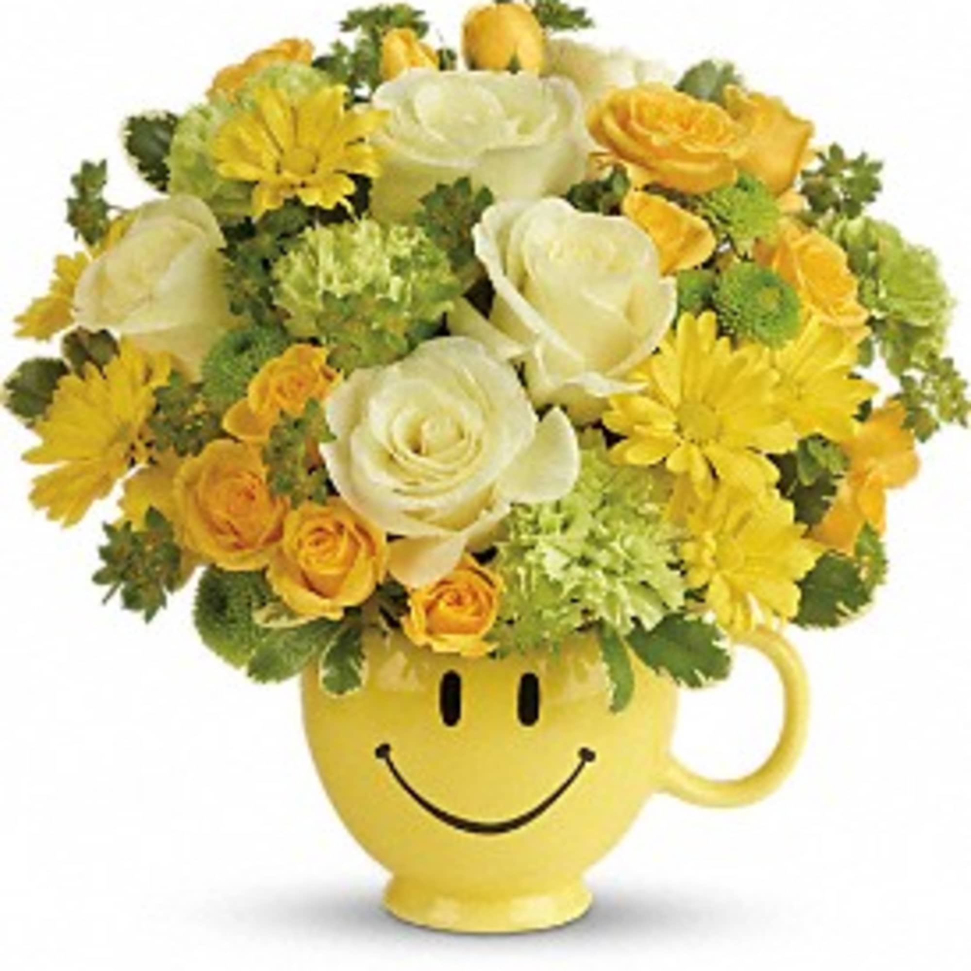Yellow smiley-face mug filled with yellow and white flowers