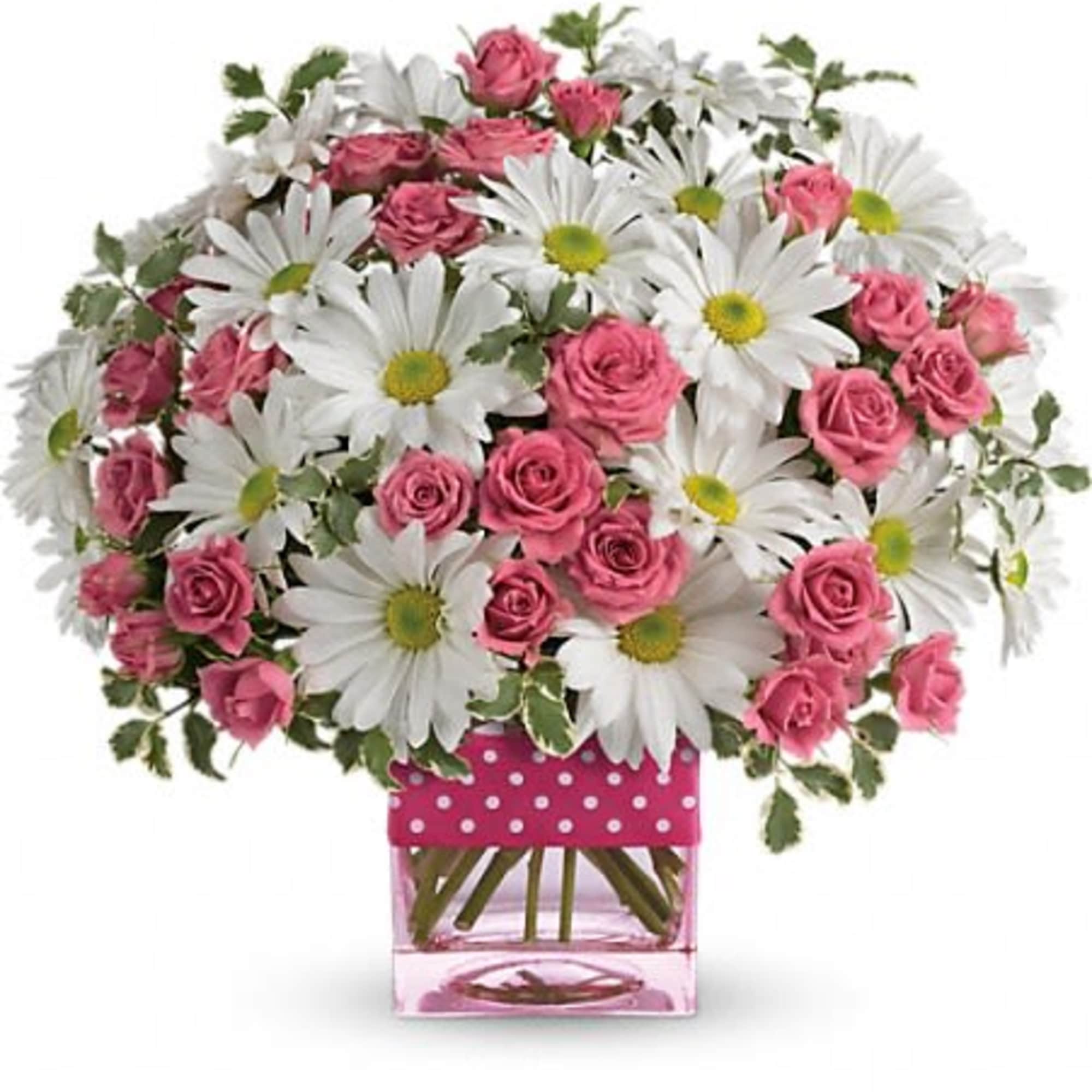 Pink roses and white daisies arranged in a pink square vase