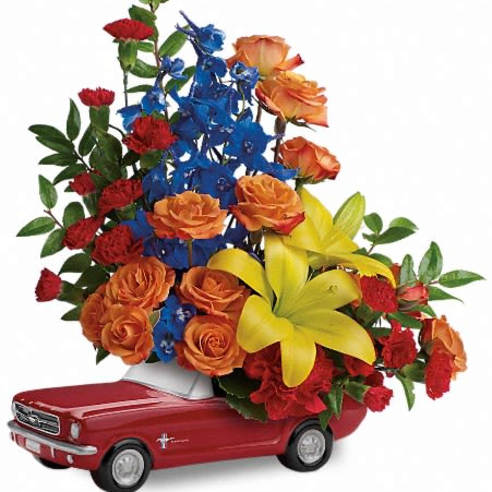 Colorful flower arrangement in a red toy car container