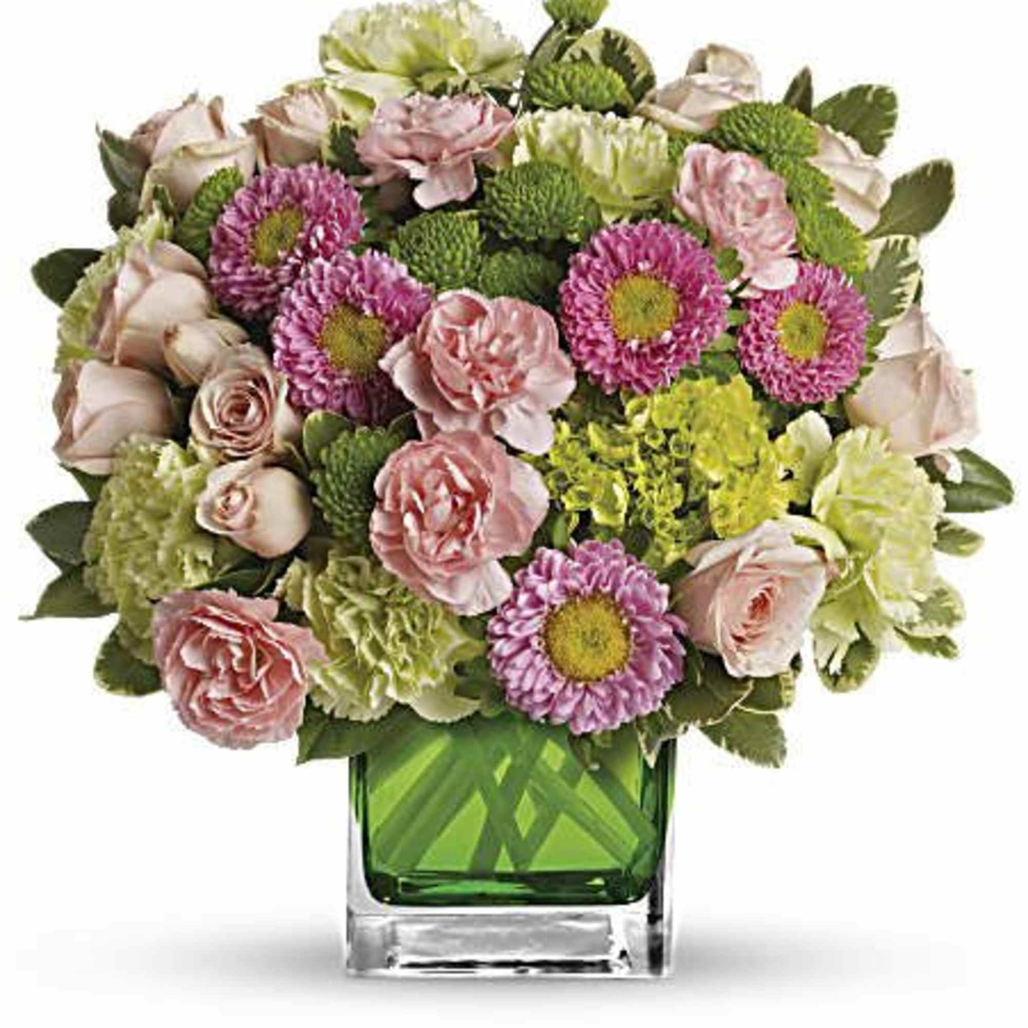 Pink and green mixed bouquet in a square glass vase