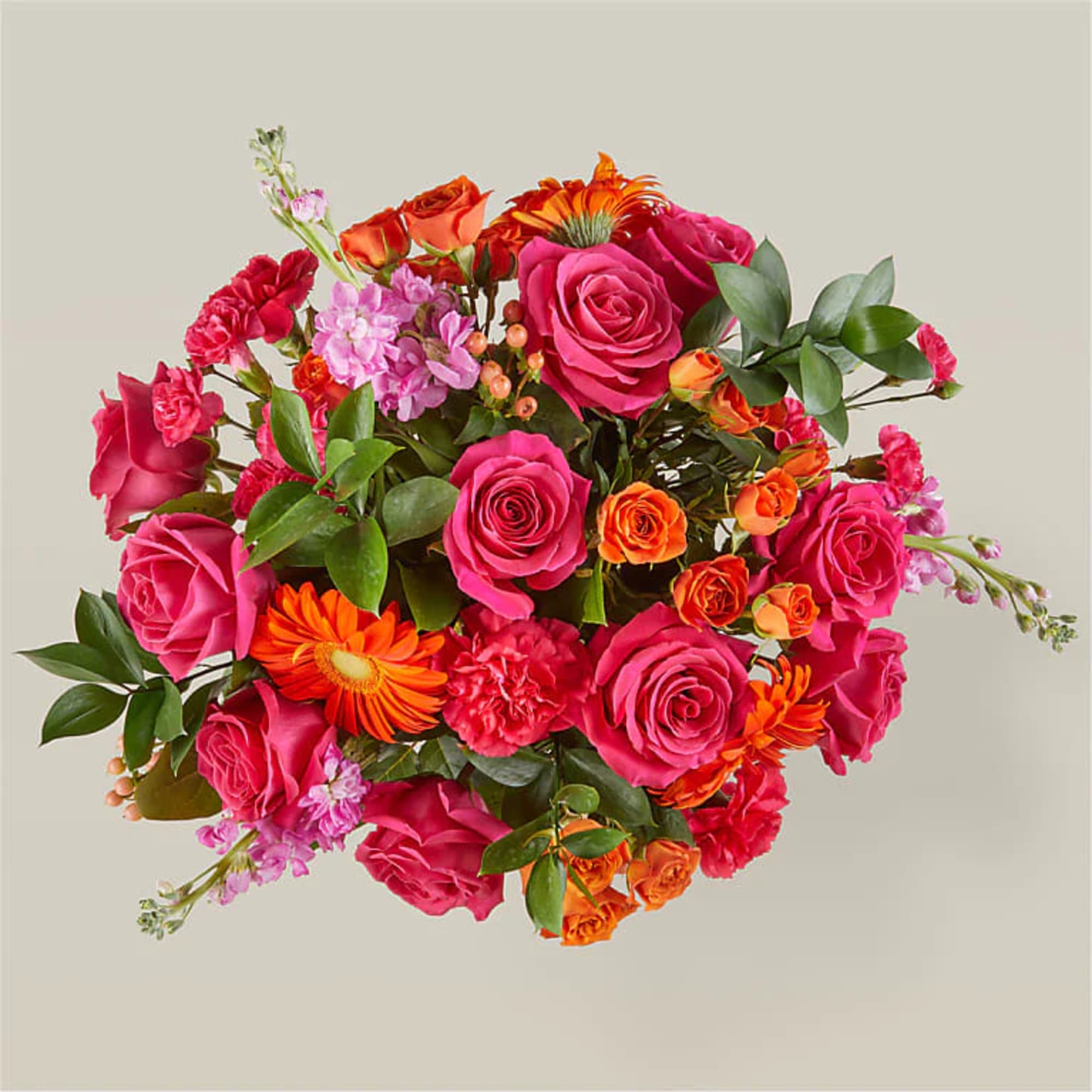 Mixed bouquet of pink and orange roses with gerbera daisies