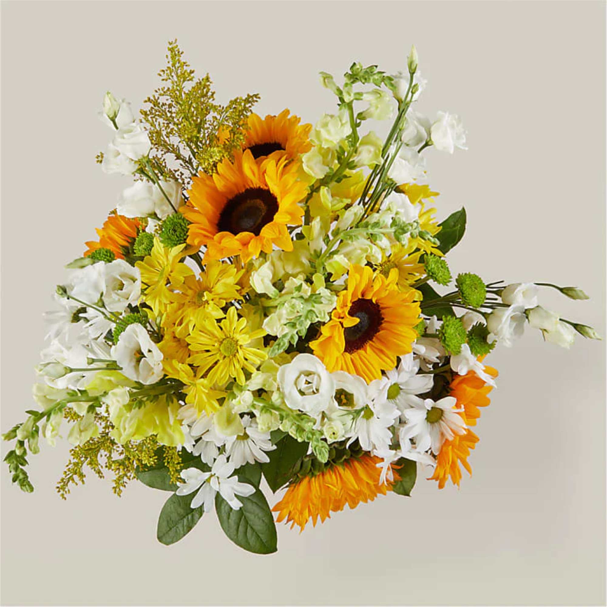 Give a dose of sunshine in bloom. This stunning bouquet is teeming, photo 2 of 4