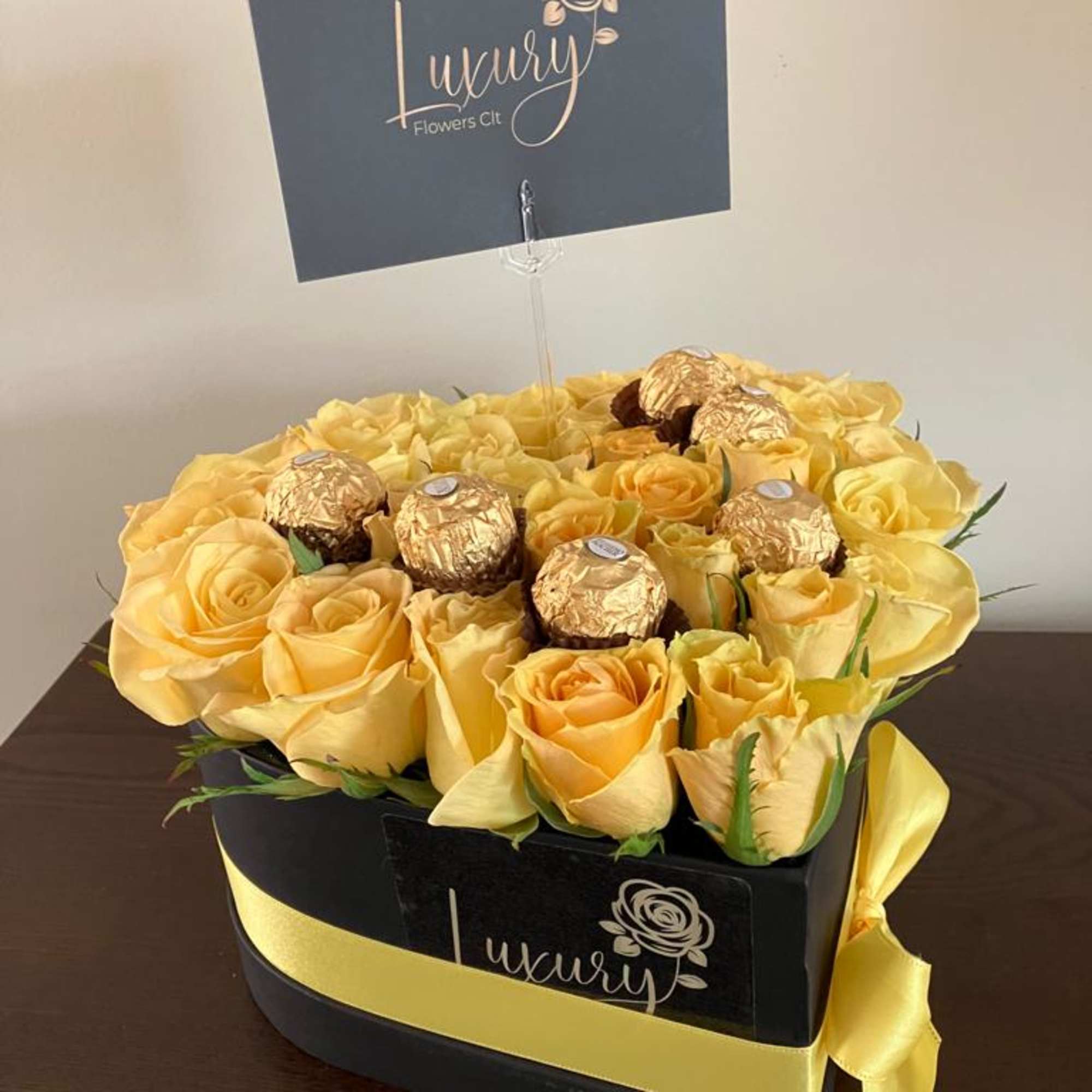 Candy Heart Box is an exclusive design of fresh roses and chocolates